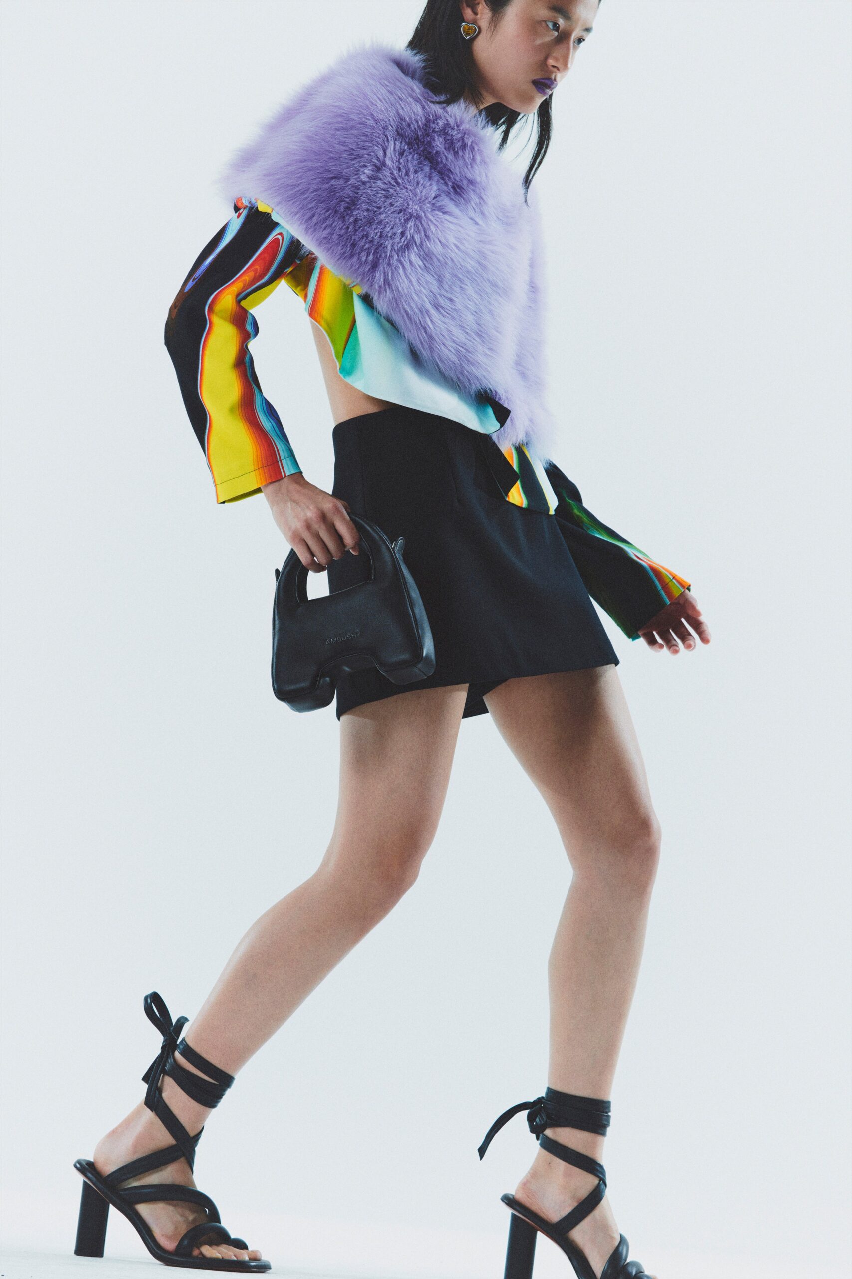 multi-colored silk top with black mini skirt