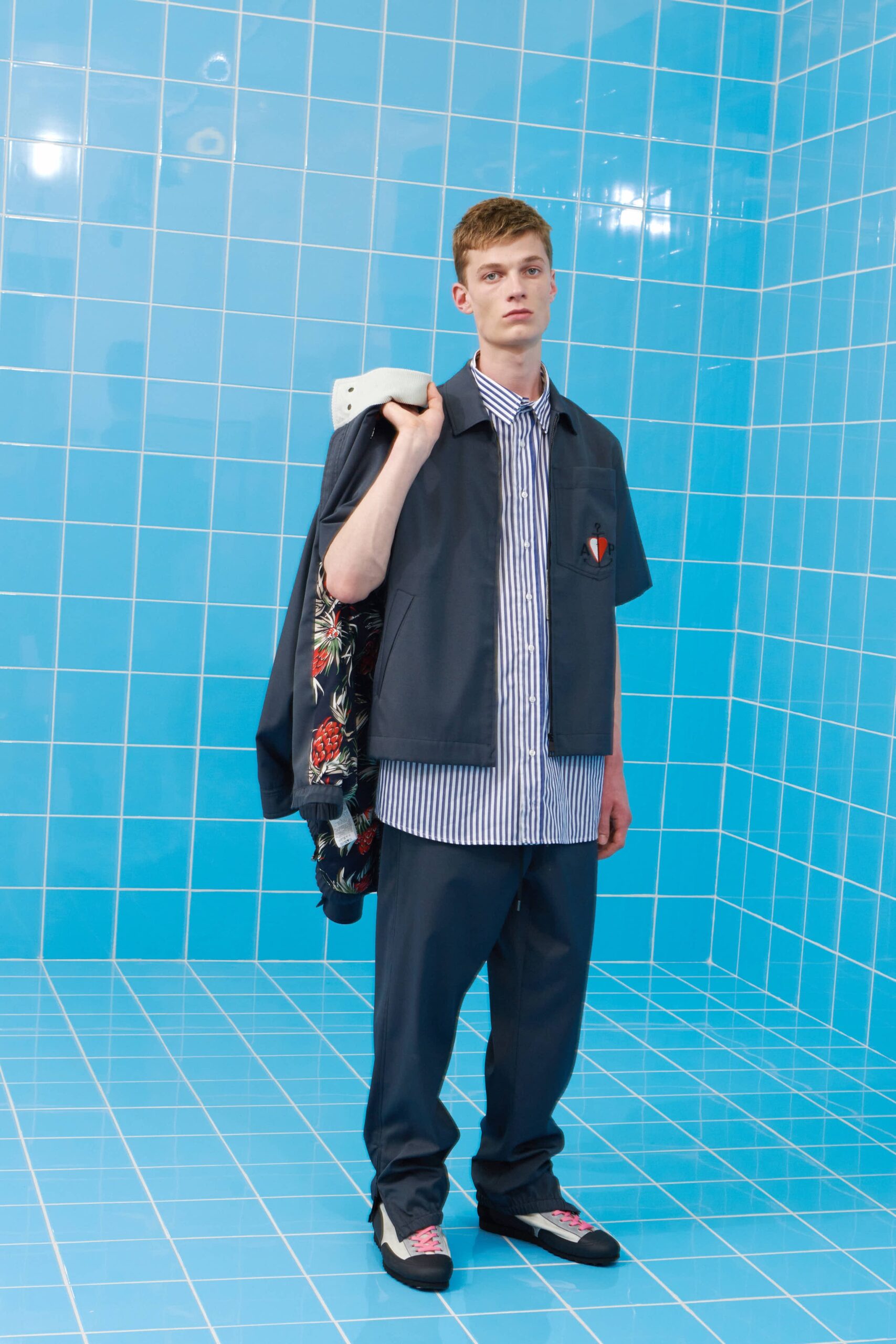 blue striped shirt gray vest
