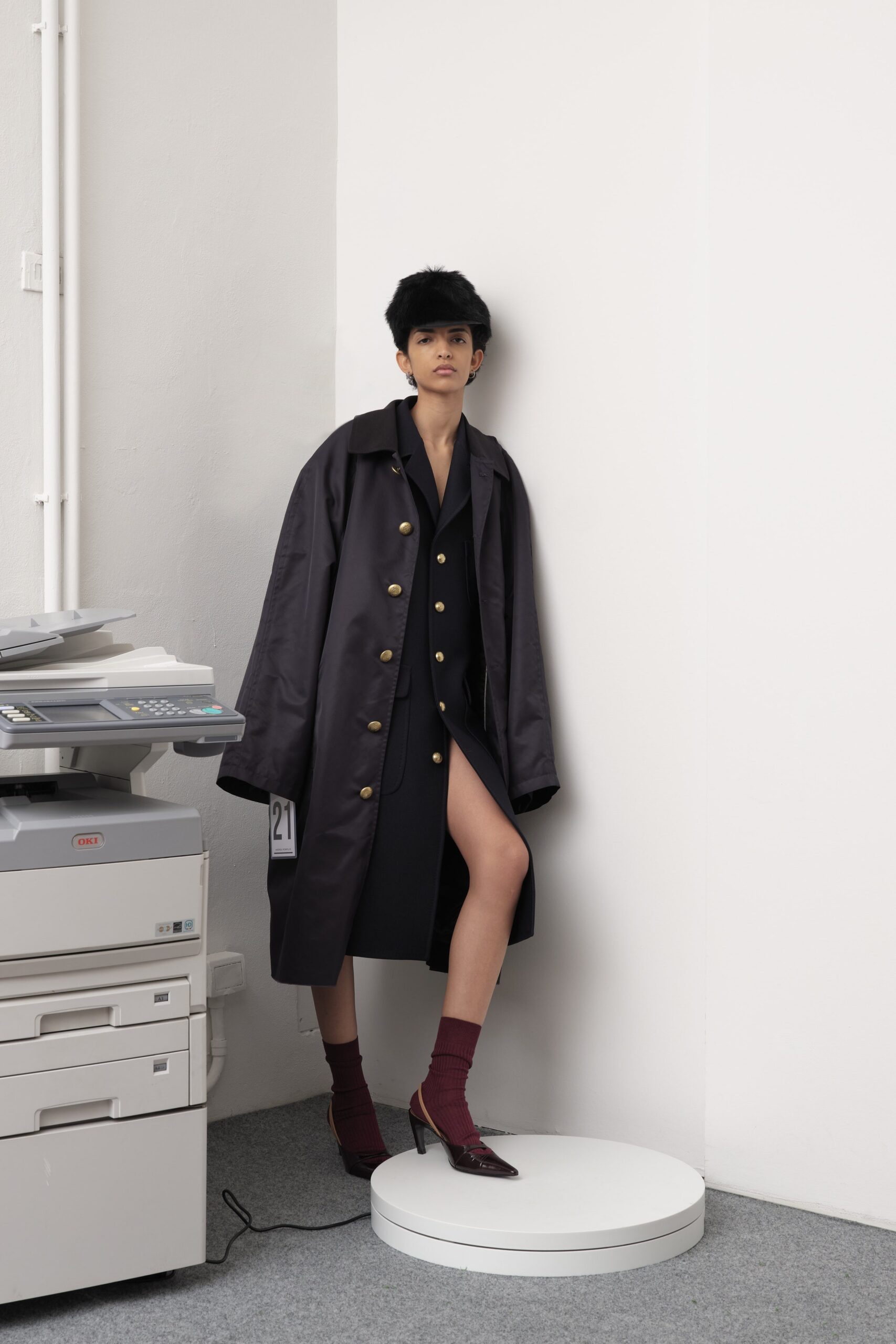 black cotton long-sleeve collared oversized buttoned coat