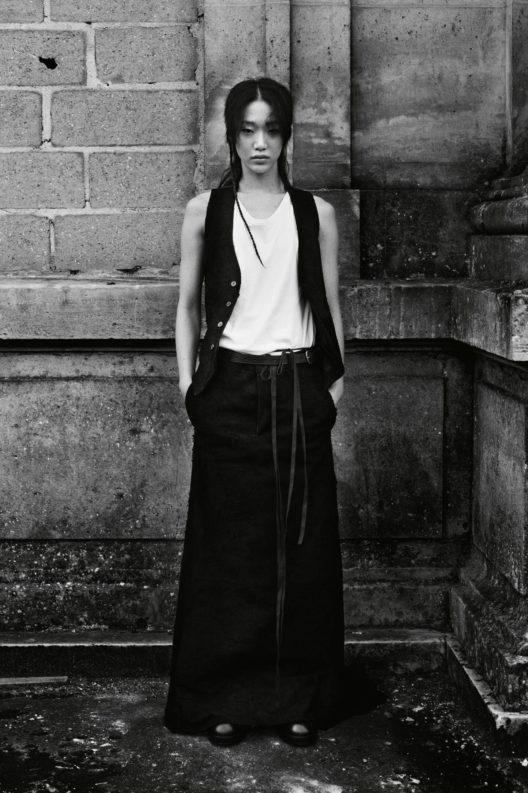 black vest white top black skirt