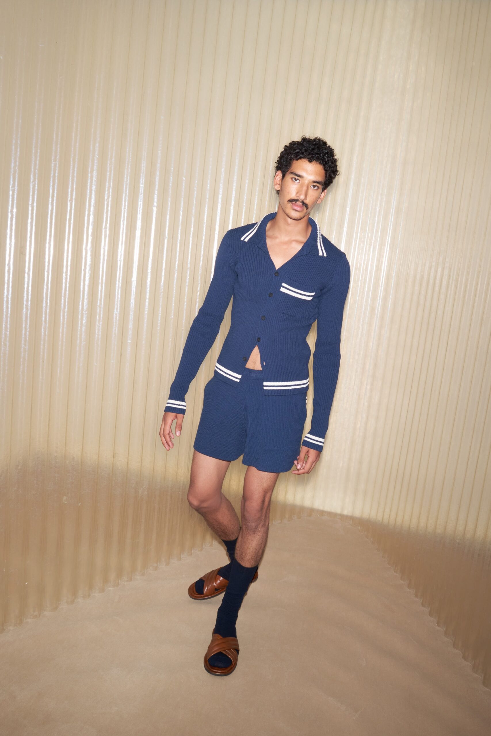 blue fitted cardigan and shorts