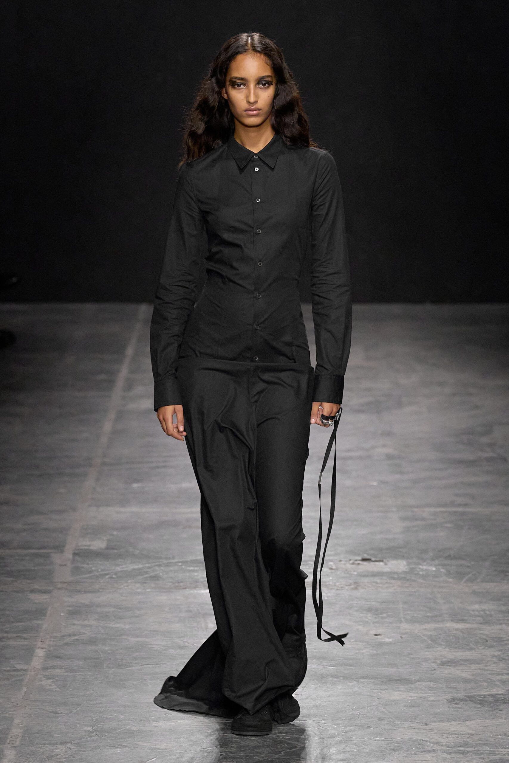 black fitted shirt and relaxed pants