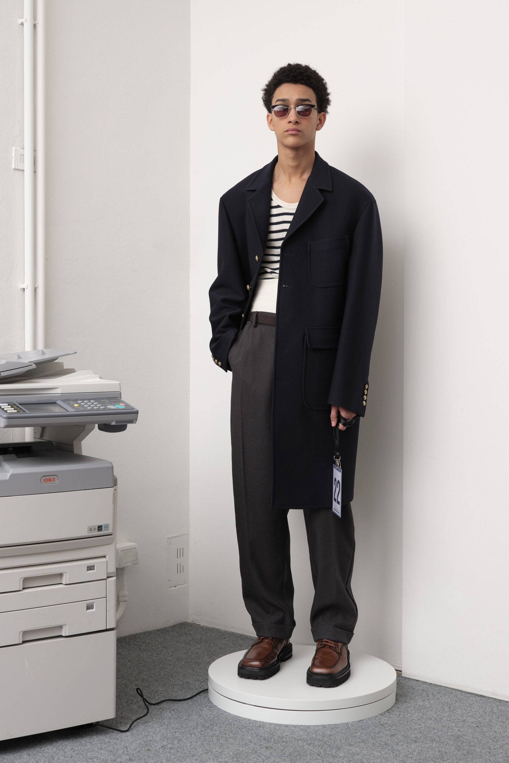 black wool coat with striped shirt
