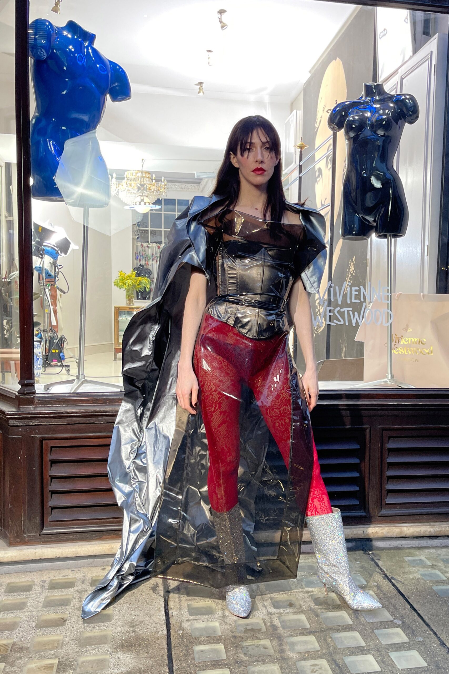 black vinyl corset with red lace pants