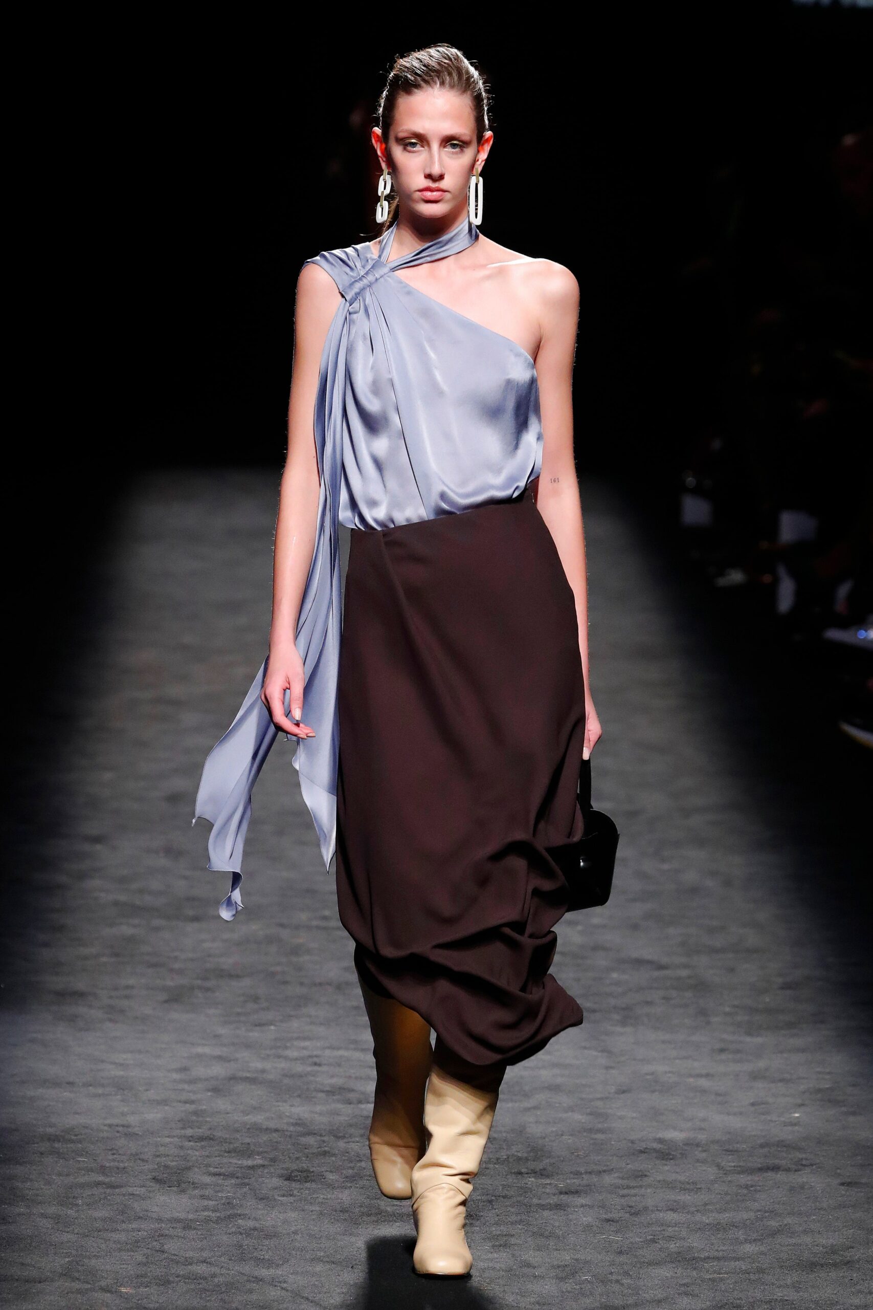 blue and brown draped midi dress with boots