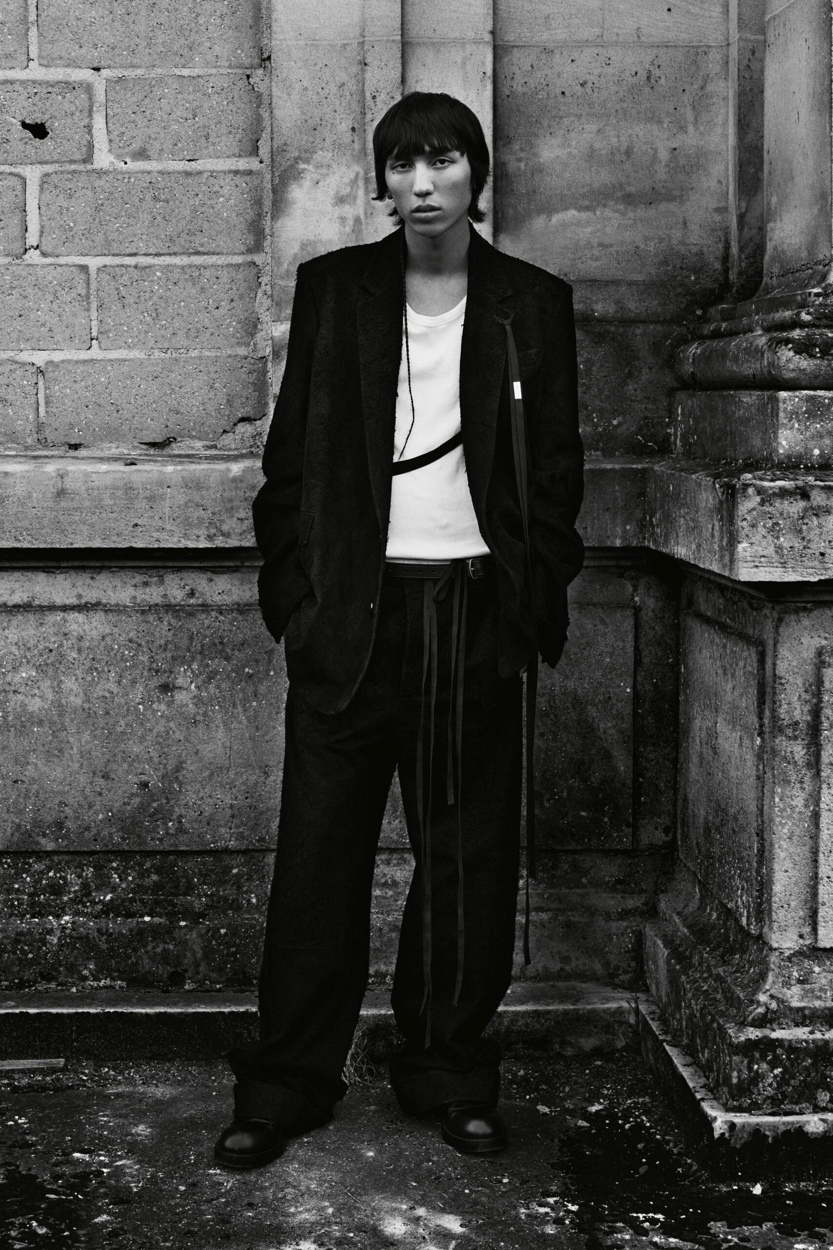 black suit with white t-shirt