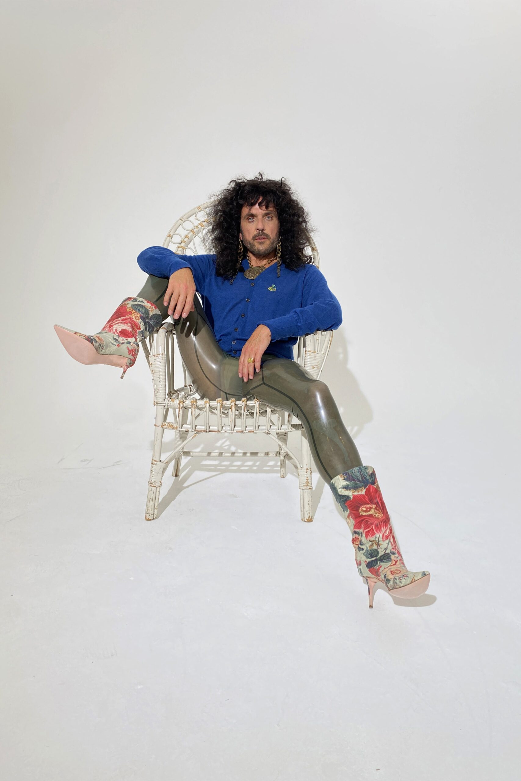 blue cotton shirt with shiny green pants