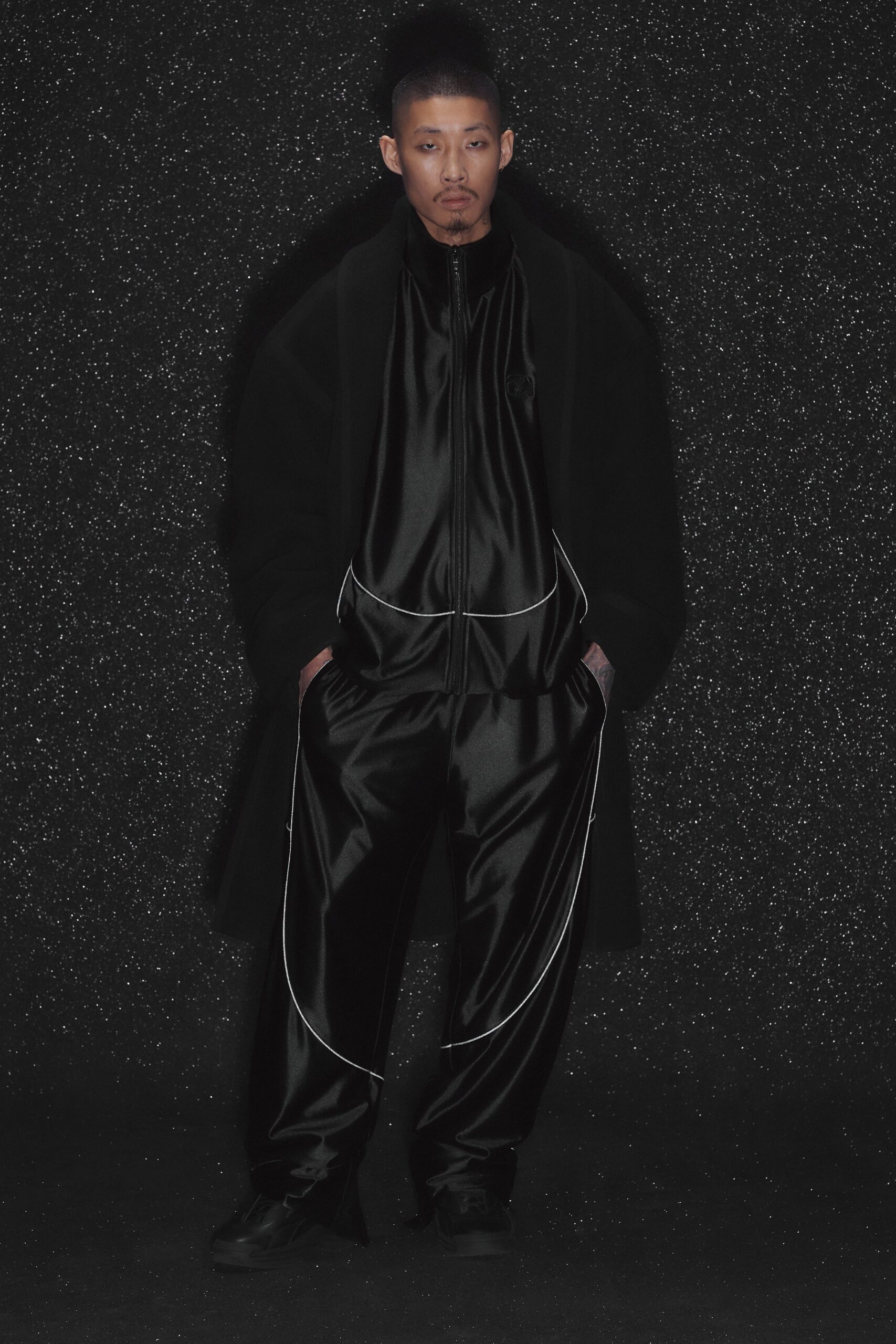 black wool long-sleeve oversized draped coat