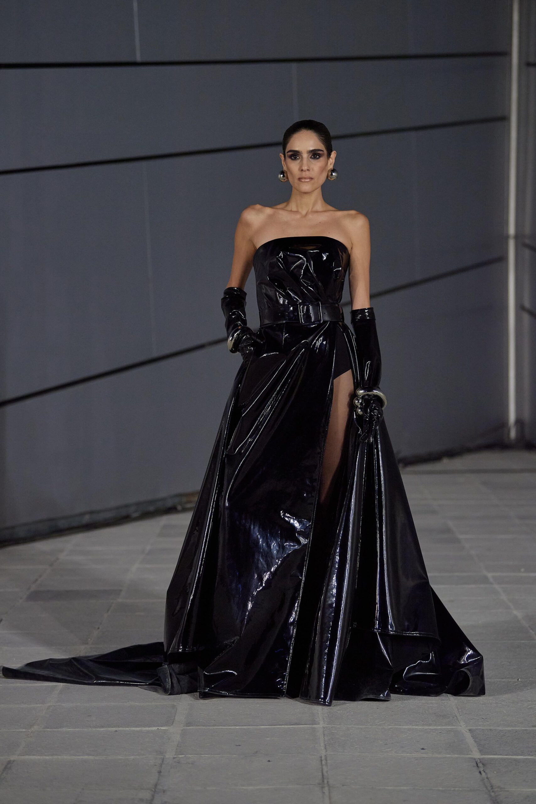 black vinyl strapless gown