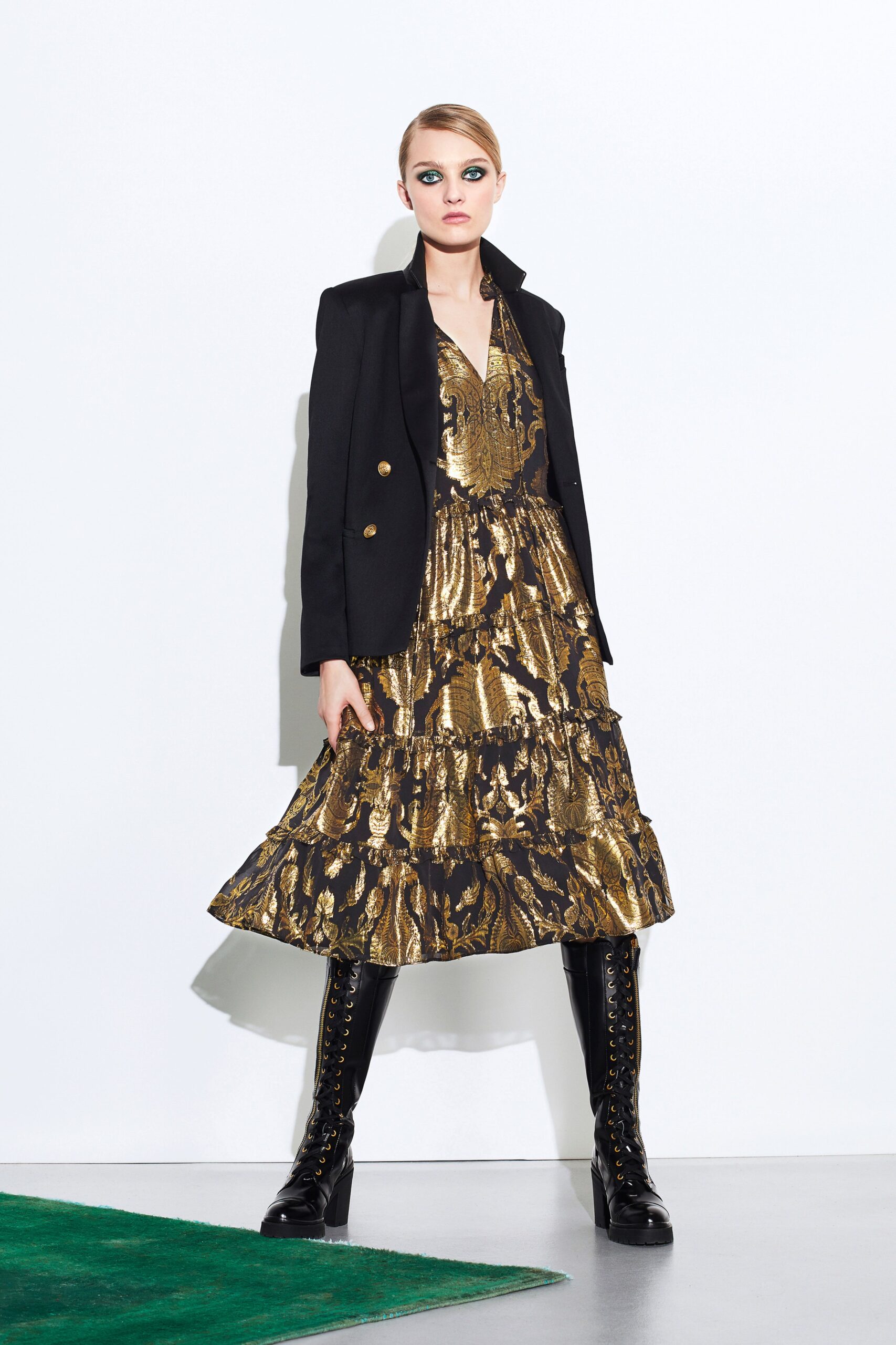 gold and black tiered dress with blazer