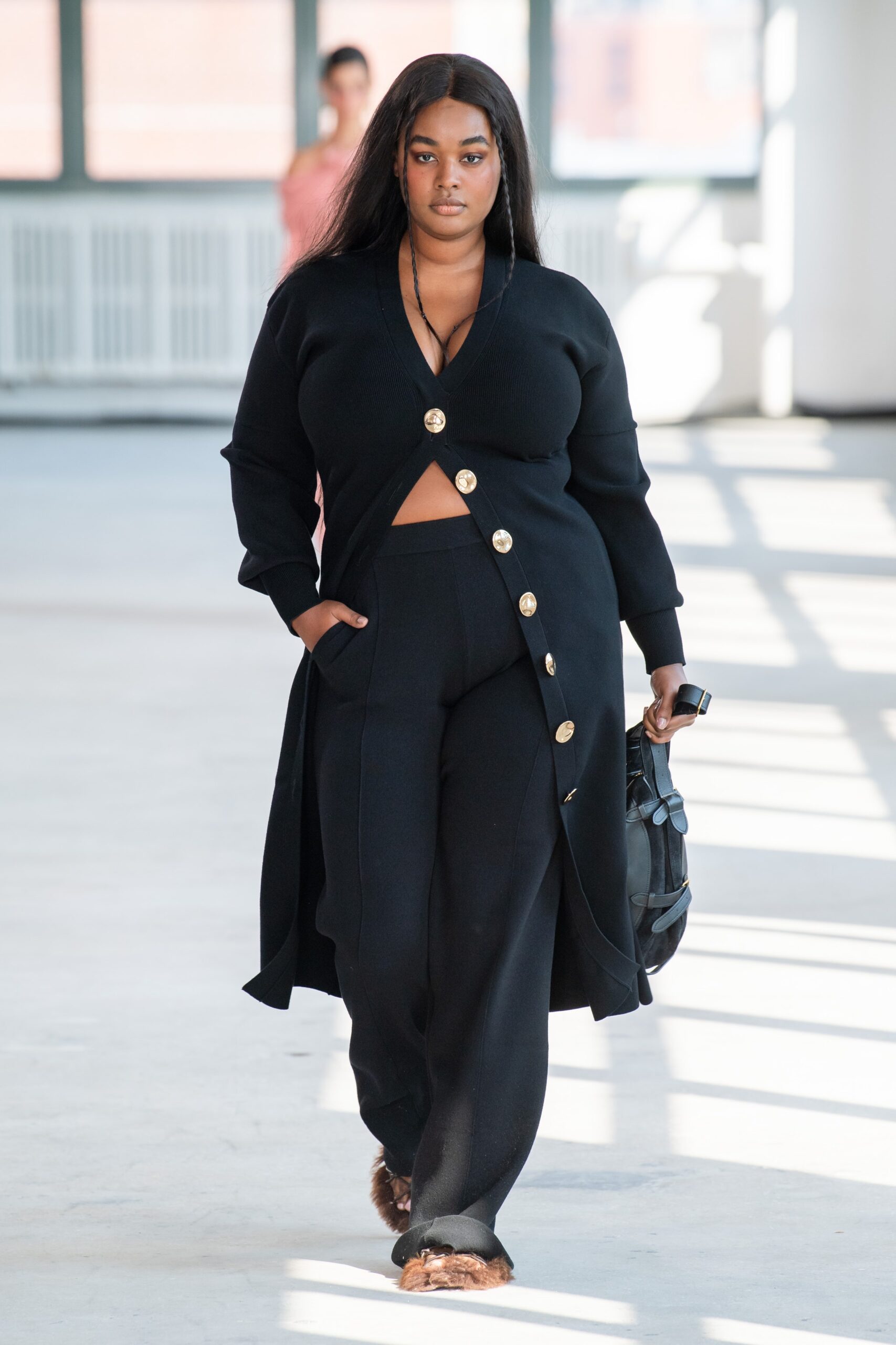 black fitted cardigan and pants