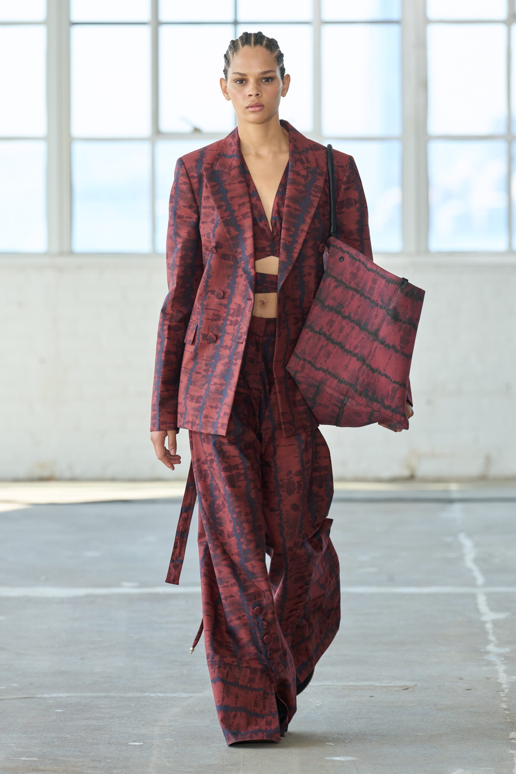 red long-sleeve collared fitted printed suit