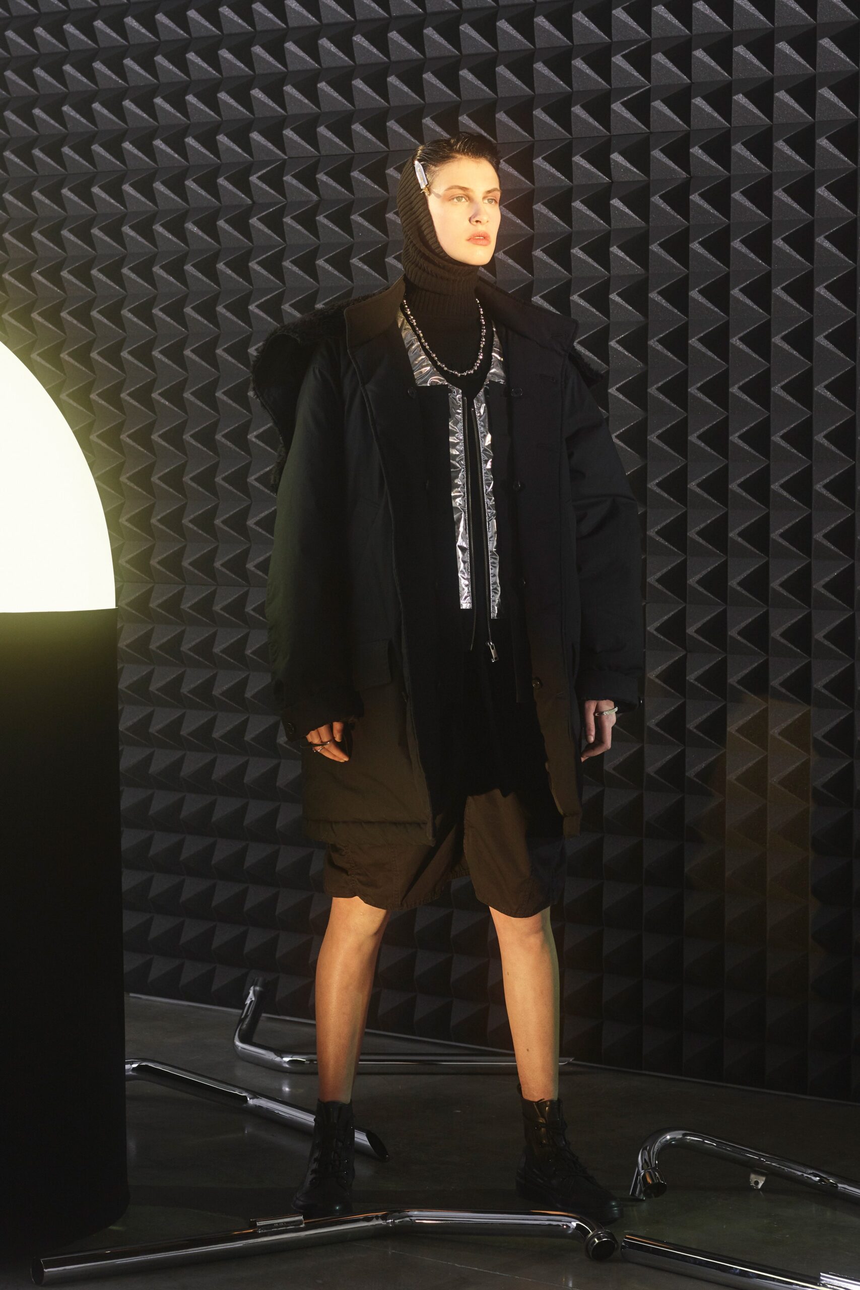 black wool sleeveless high-neck fitted top
