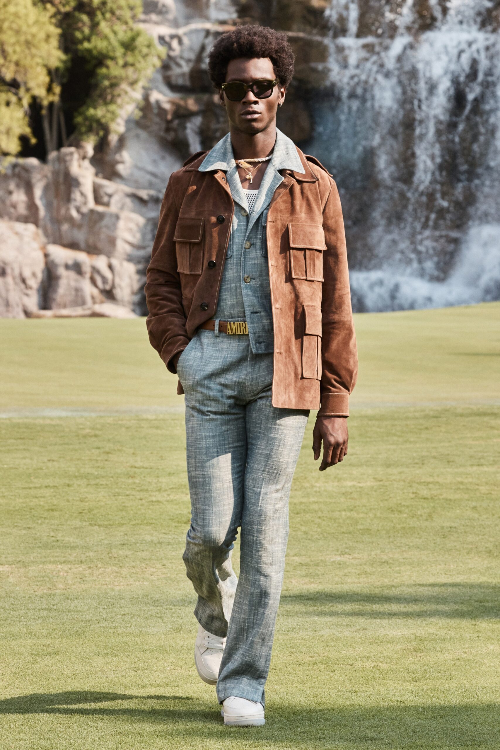 brown suede jacket with blue suit