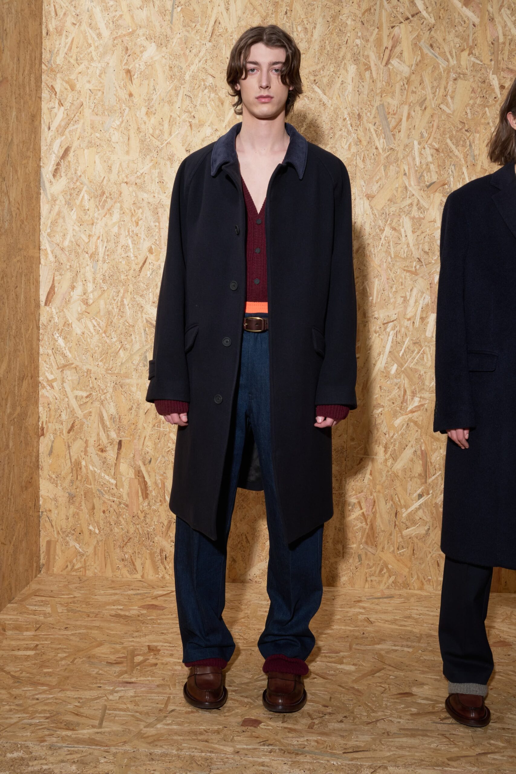 black wool coat with red shirt