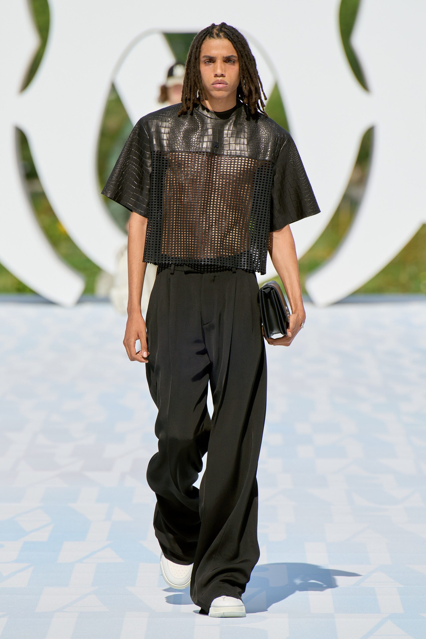 black leather top and relaxed pants
