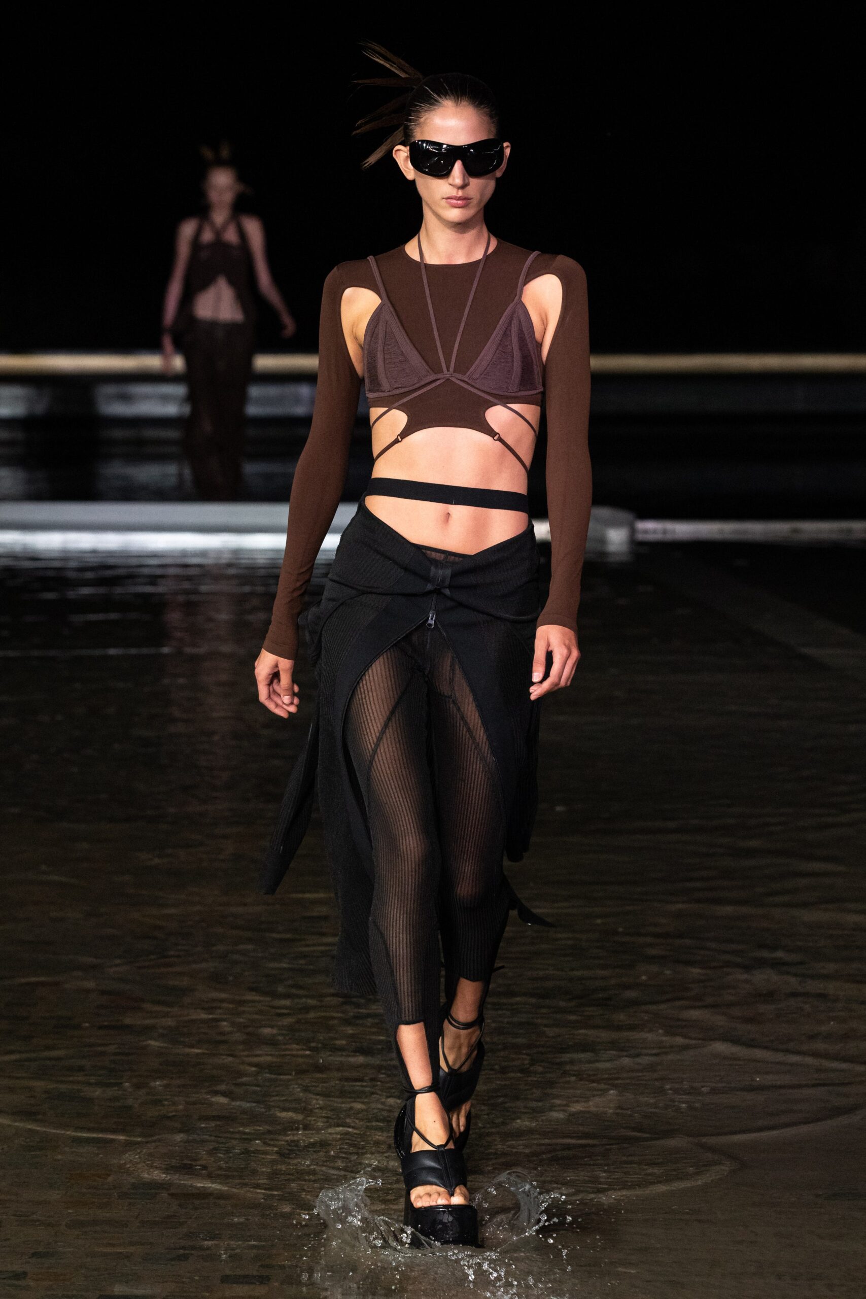 fitted brown top and black skirt