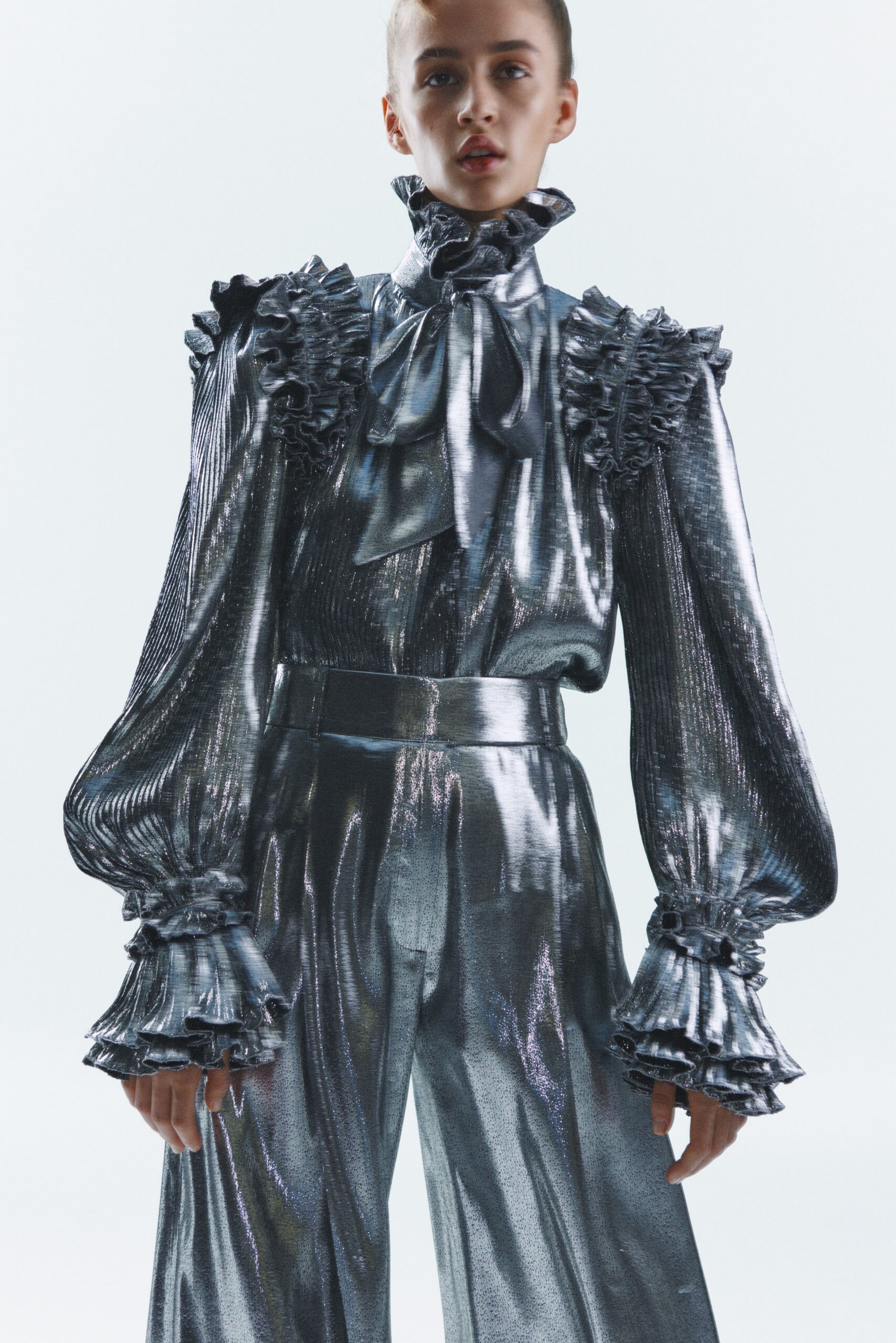gray metallic long-sleeve high-neck fitted ruffled shiny blouse