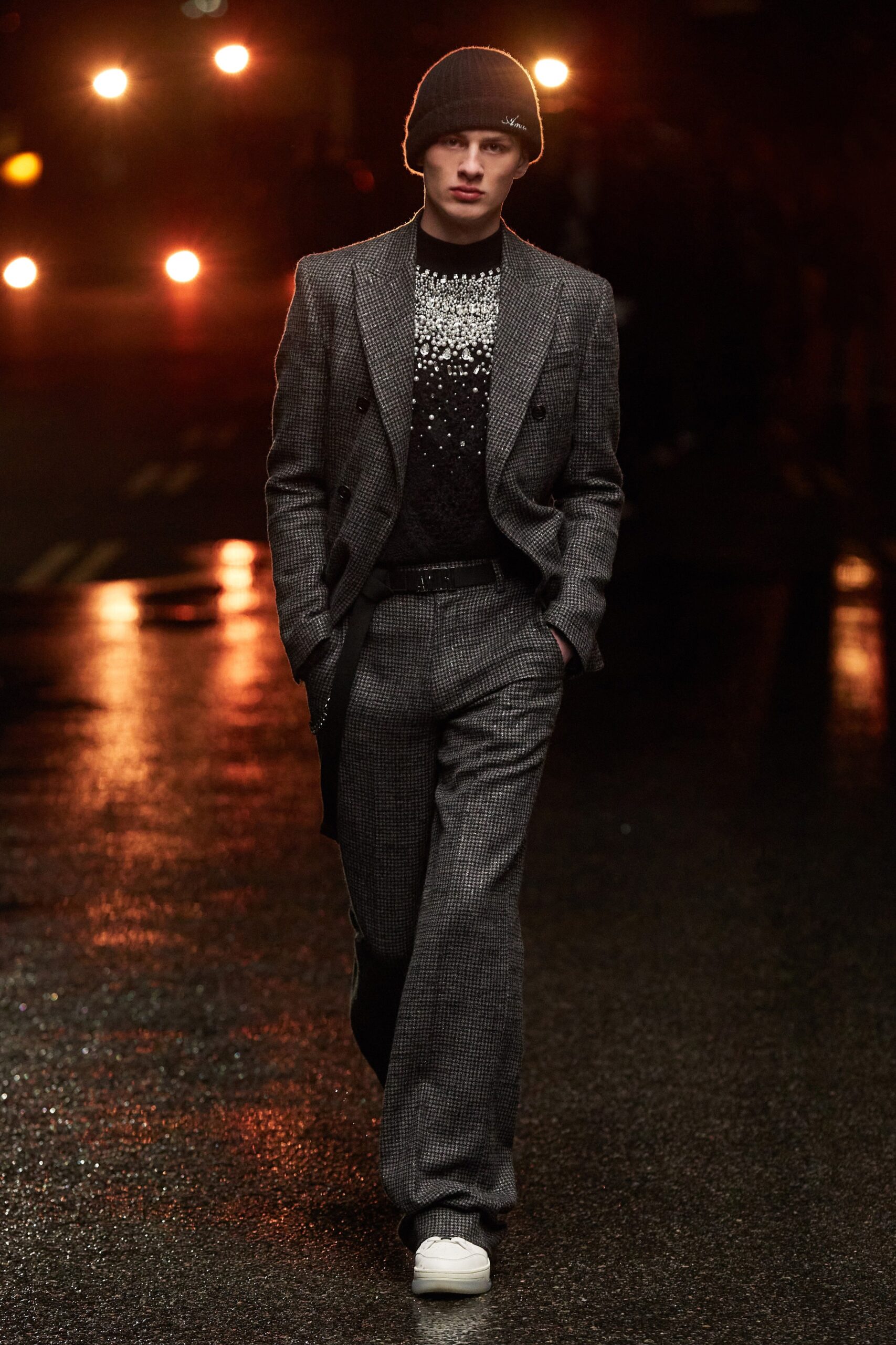 gray tailored suit with black sweater