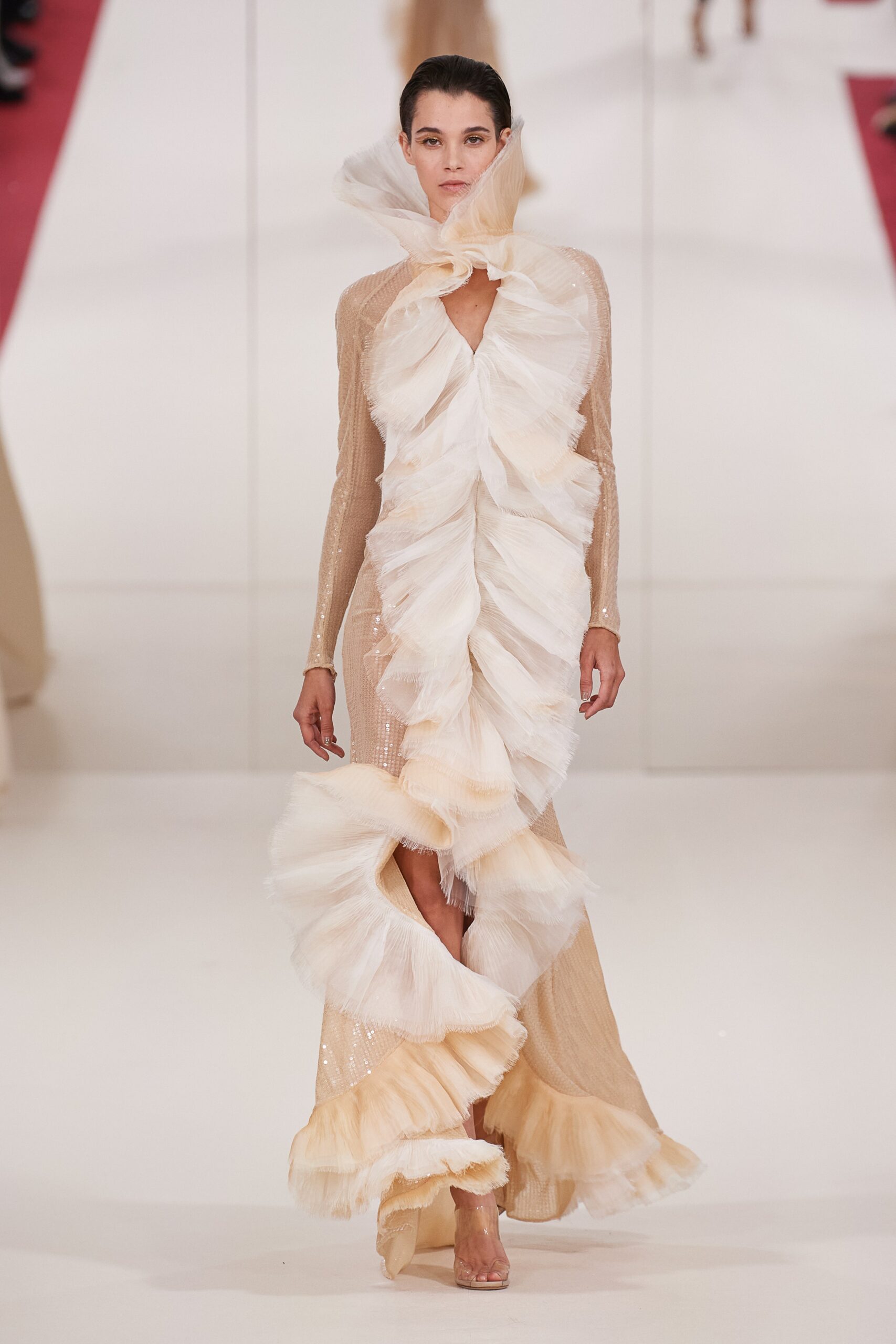 beige and white ruffled gown