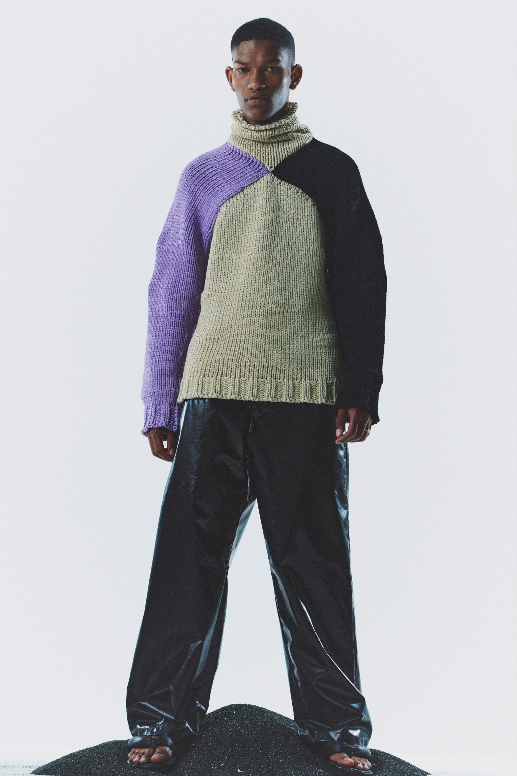 color-blocked wool sweater and vinyl pants