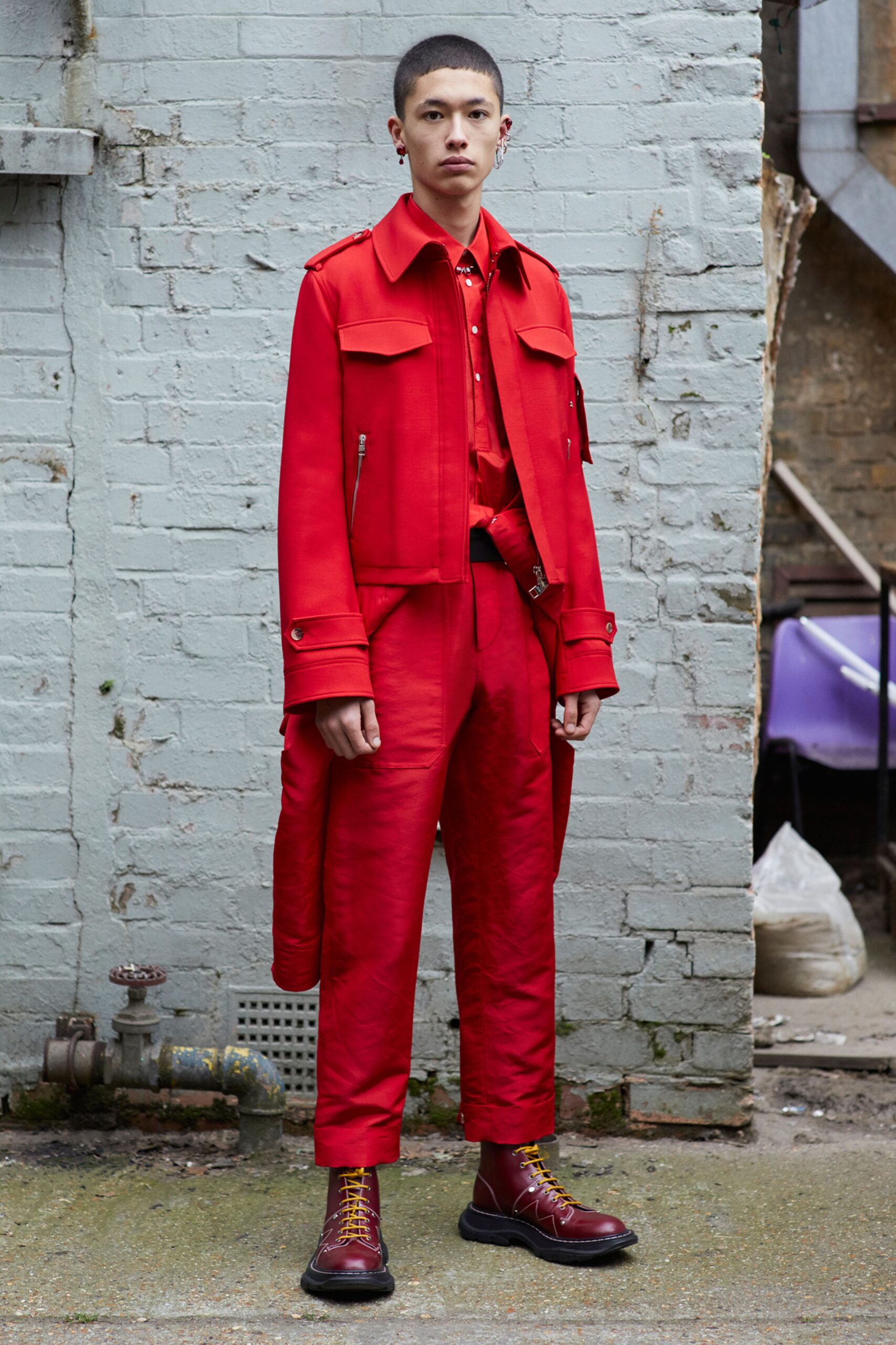 red fitted jacket and tailored pants