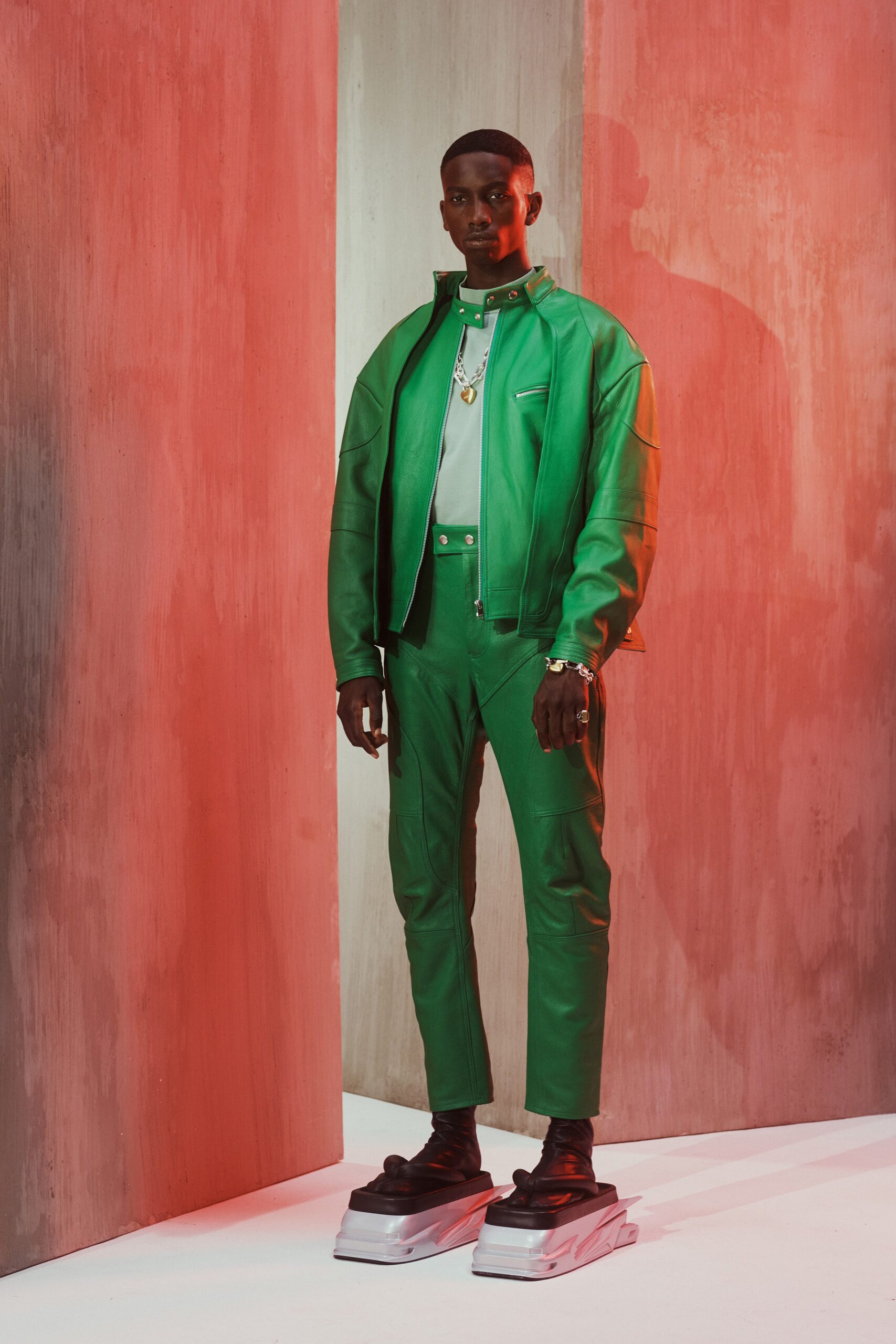green leather long-sleeve collared fitted zippered jacket