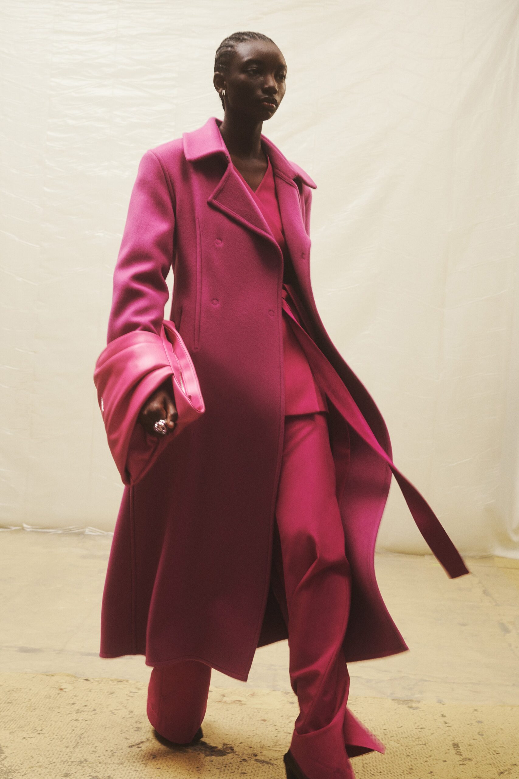 pink wool long-sleeve collared fitted layered coat