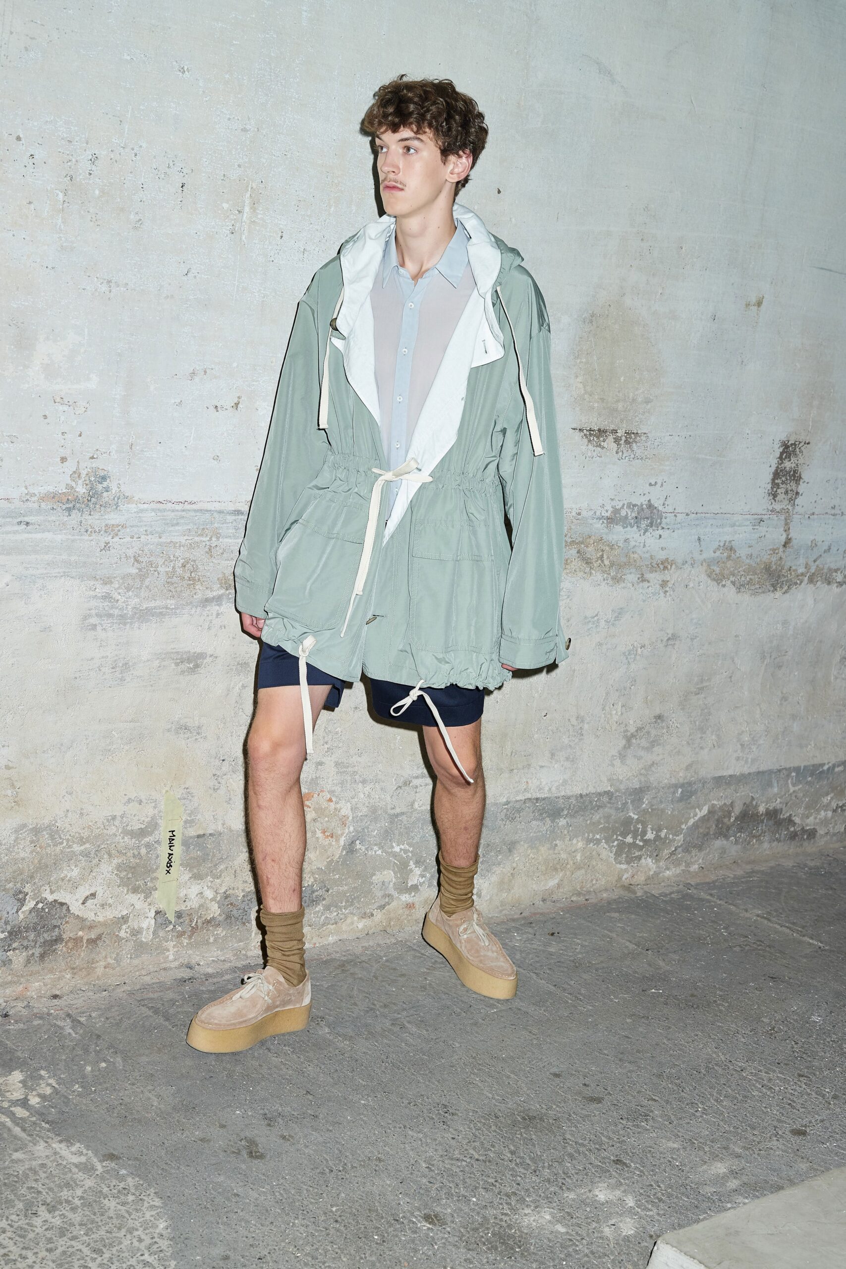 oversized green jacket with gray shirt