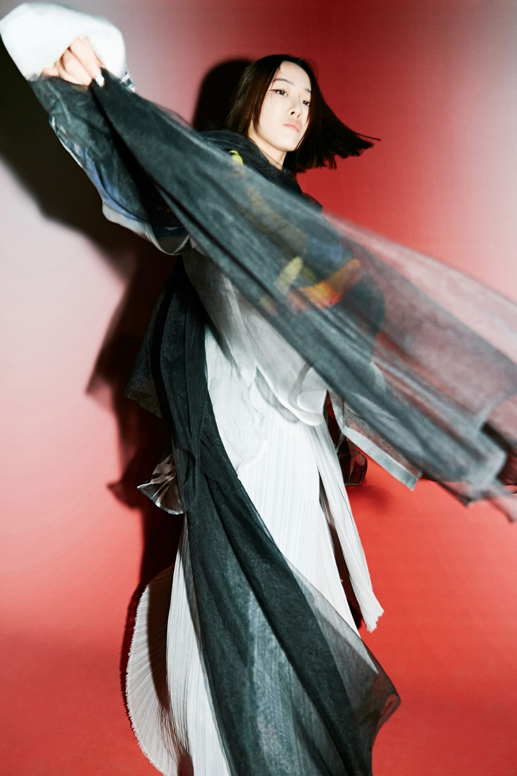 white pleated midi dress with black cape