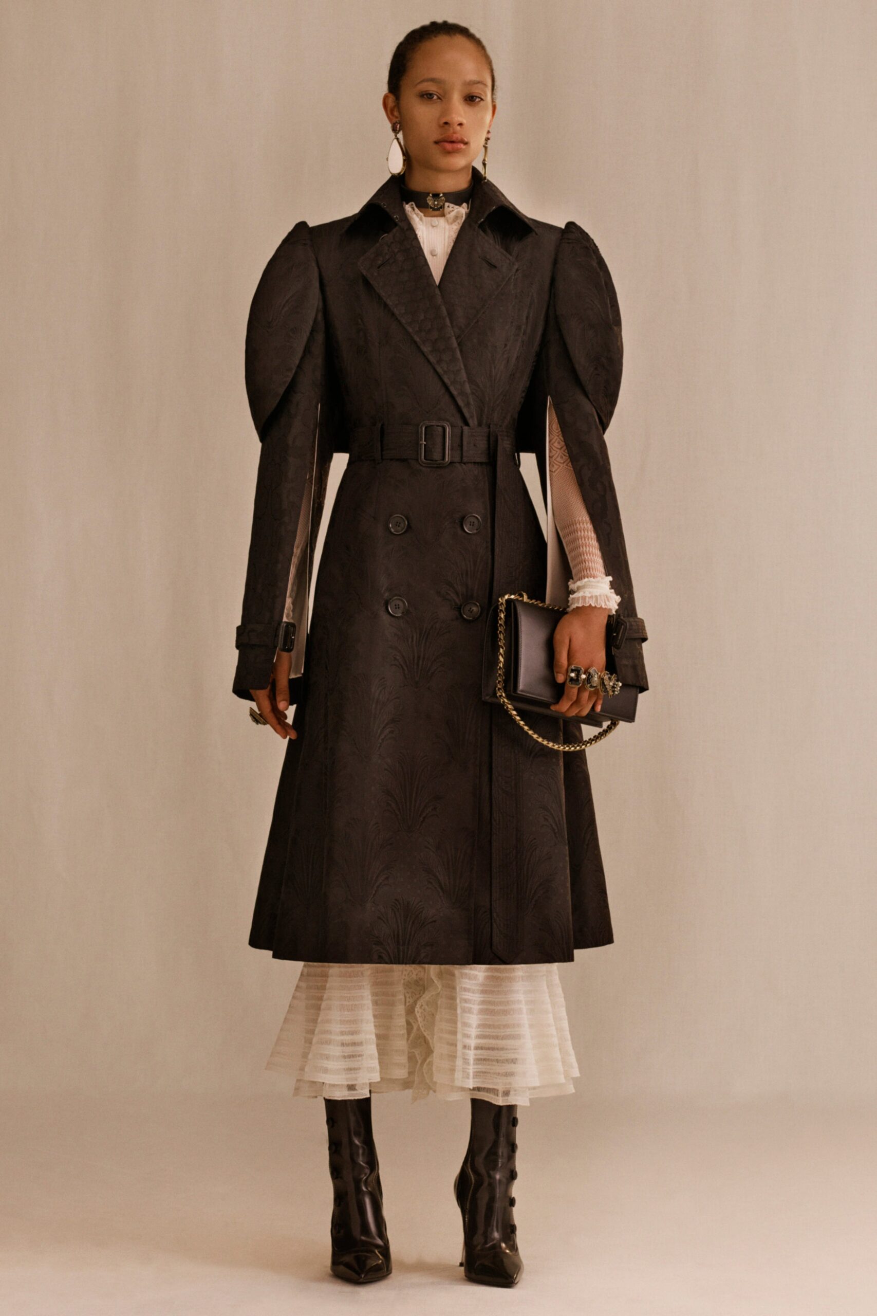 black leather long-sleeve collared fitted belted padded coat