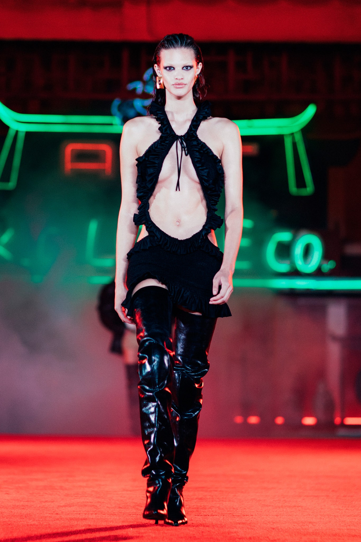 black leather fitted shiny boots