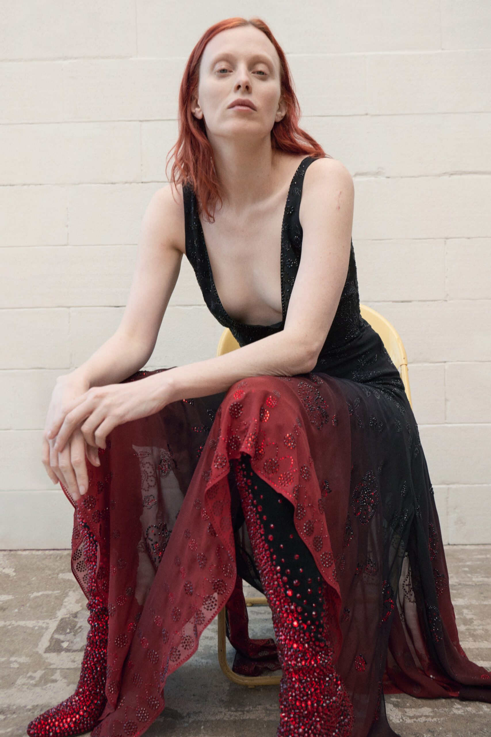 black and red flowing dress with embellished boots