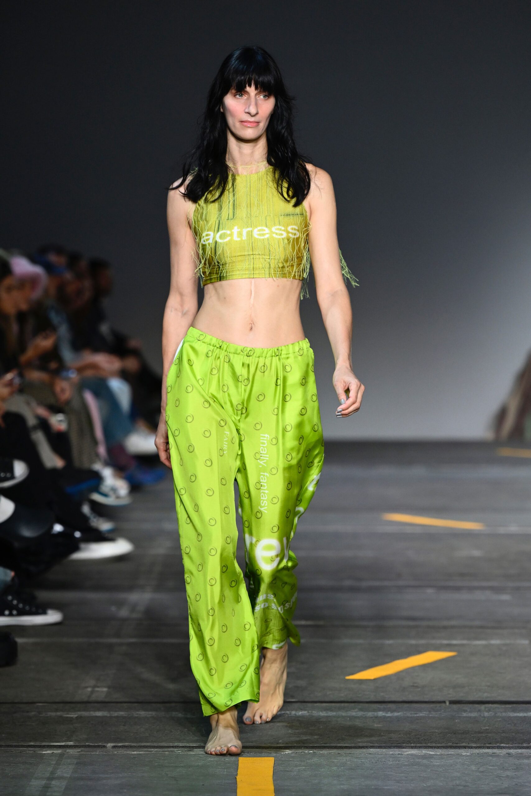 green cropped top and relaxed pants