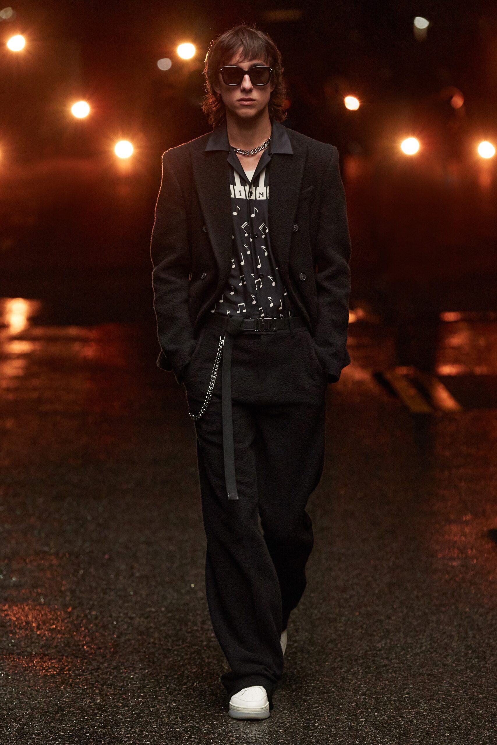 black tailored blazer with relaxed pants