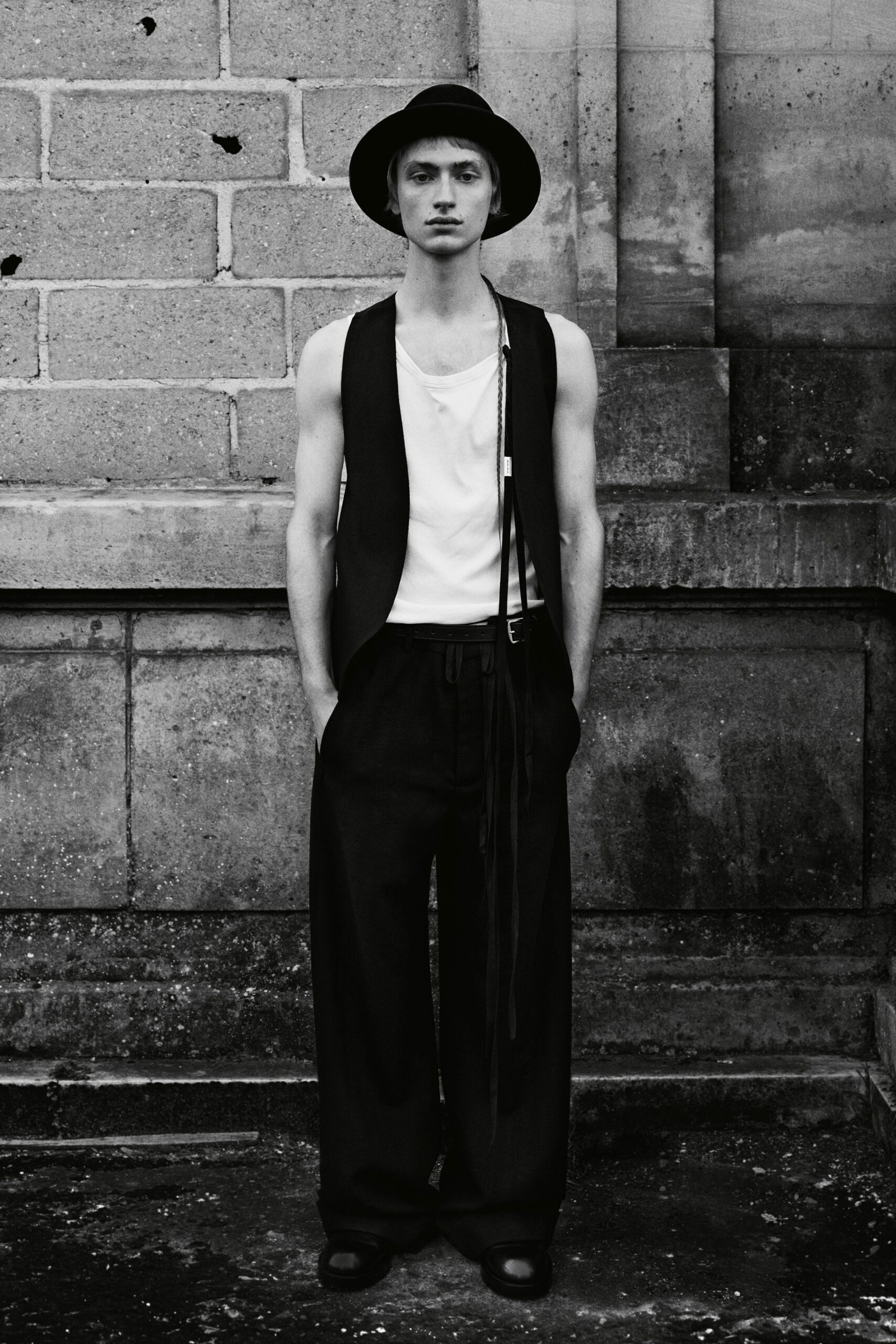 black vest white t-shirt wide-leg pants
