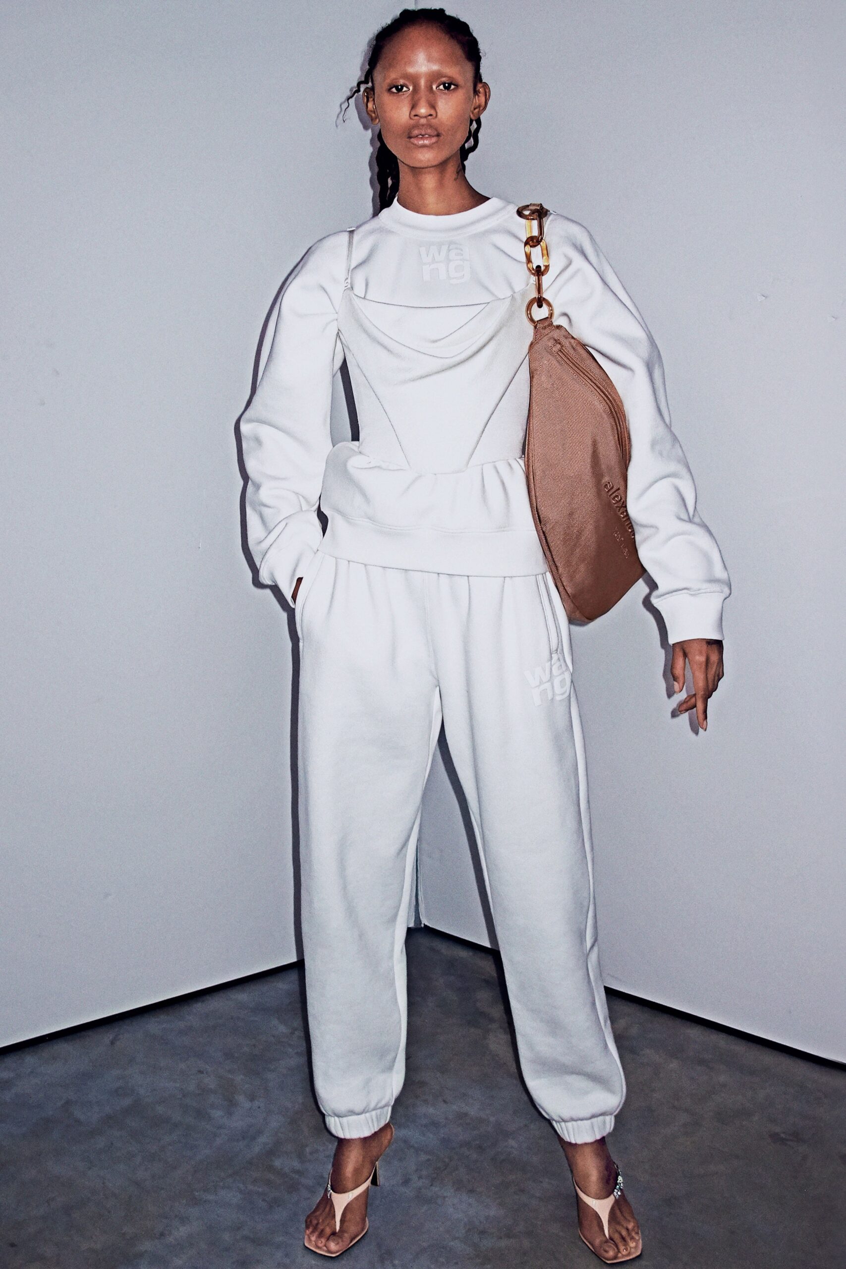 white relaxed sweater and pants
