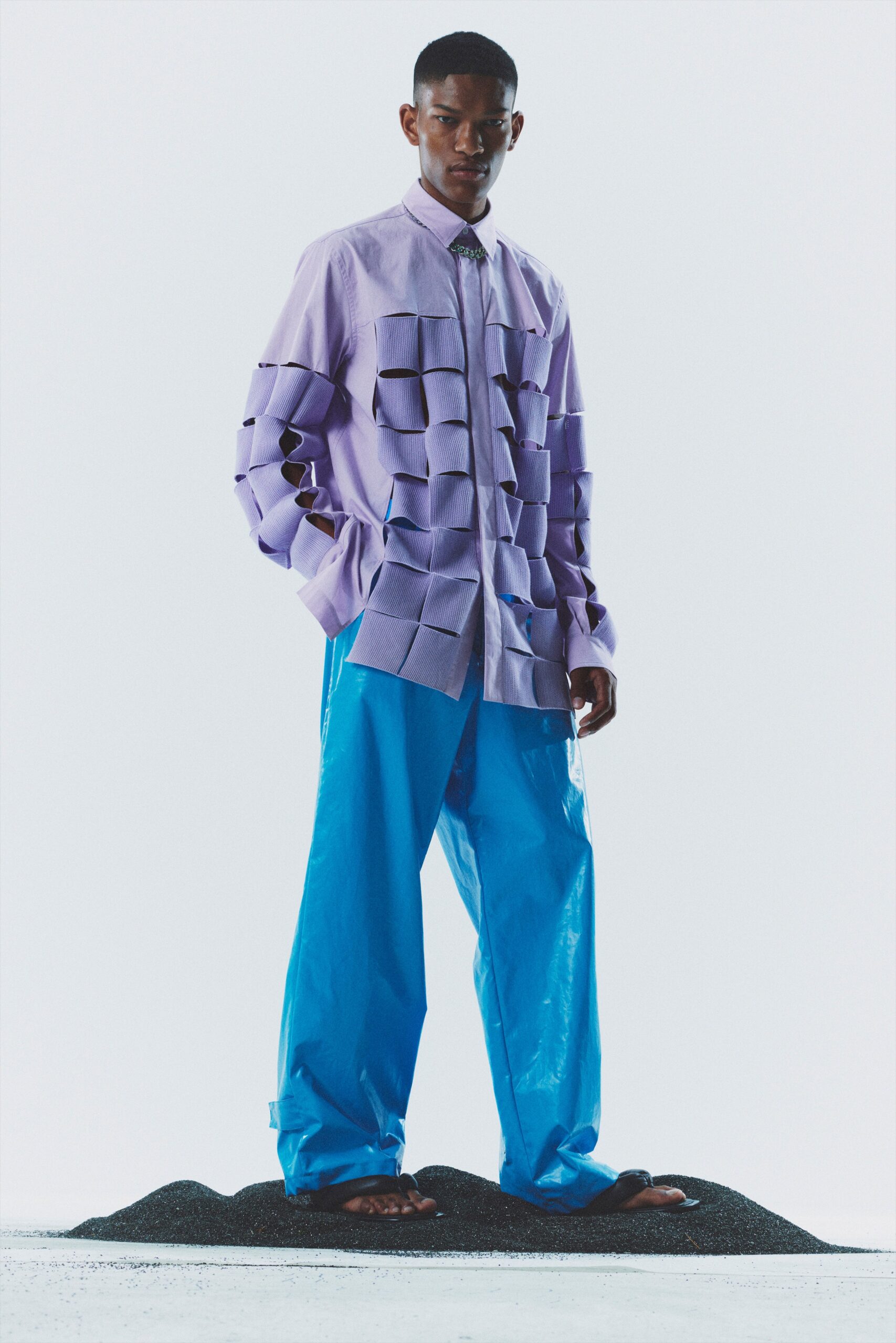 purple layered shirt with blue pants