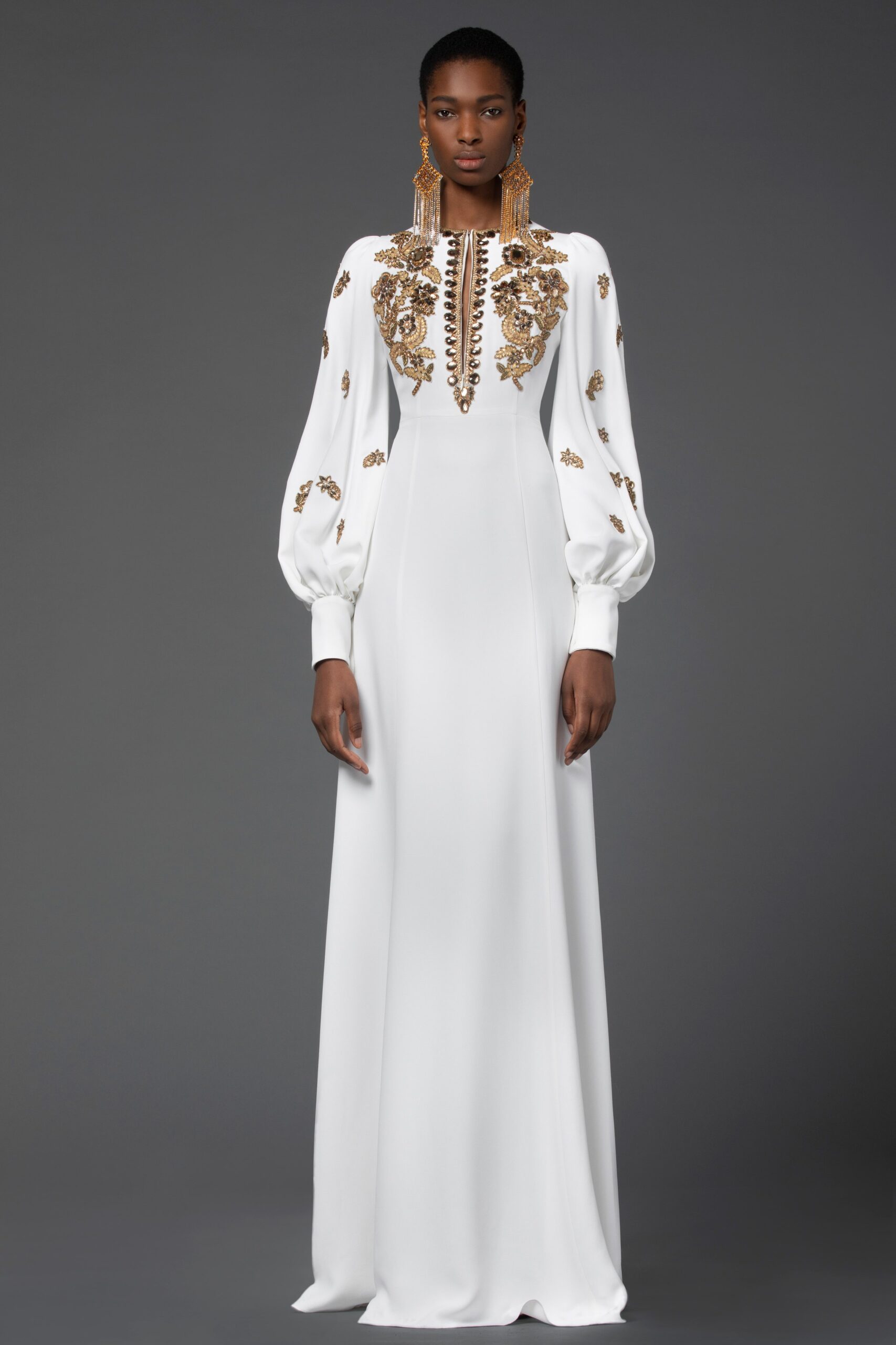 white embroidered long-sleeve gown