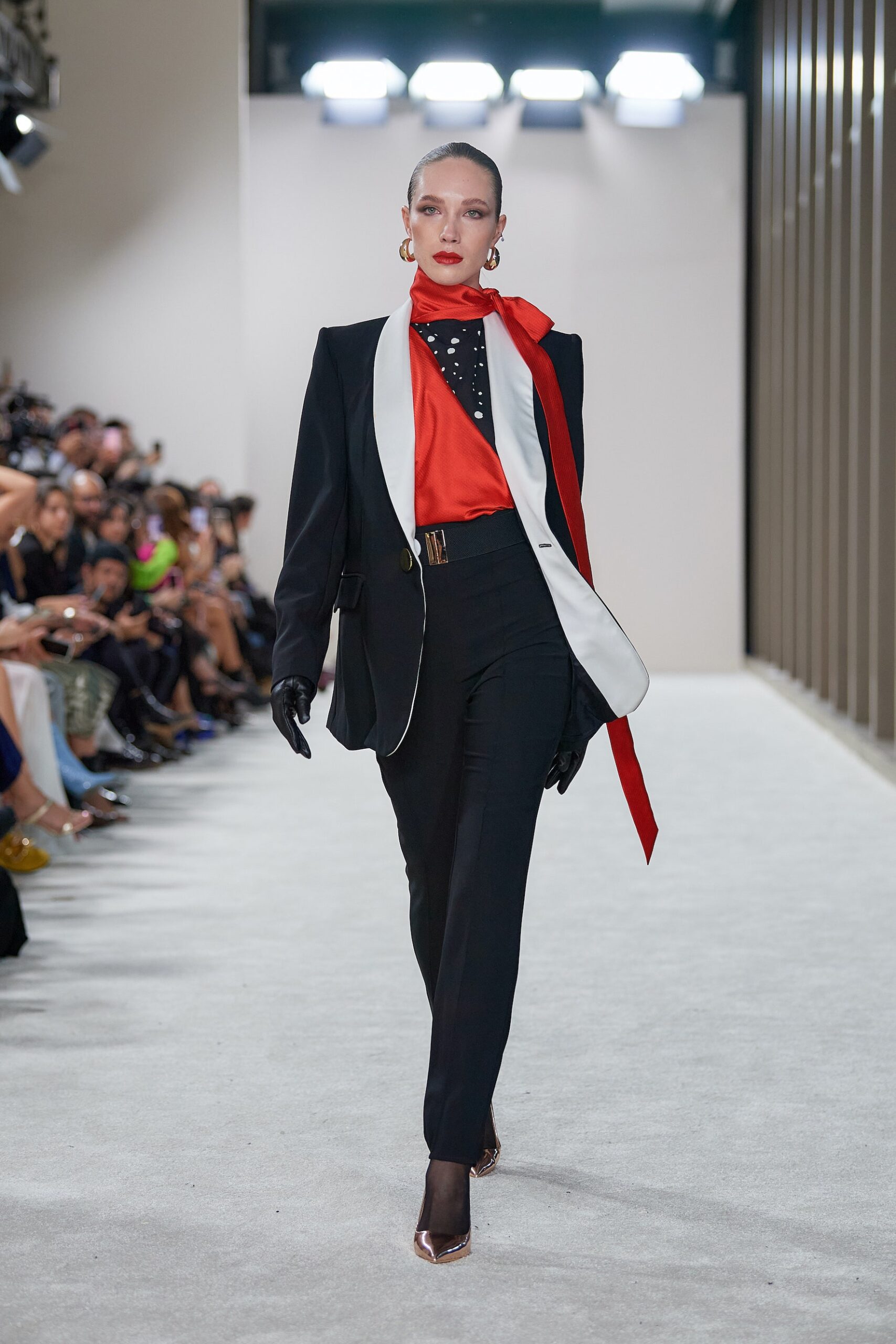 black tailored blazer with red top