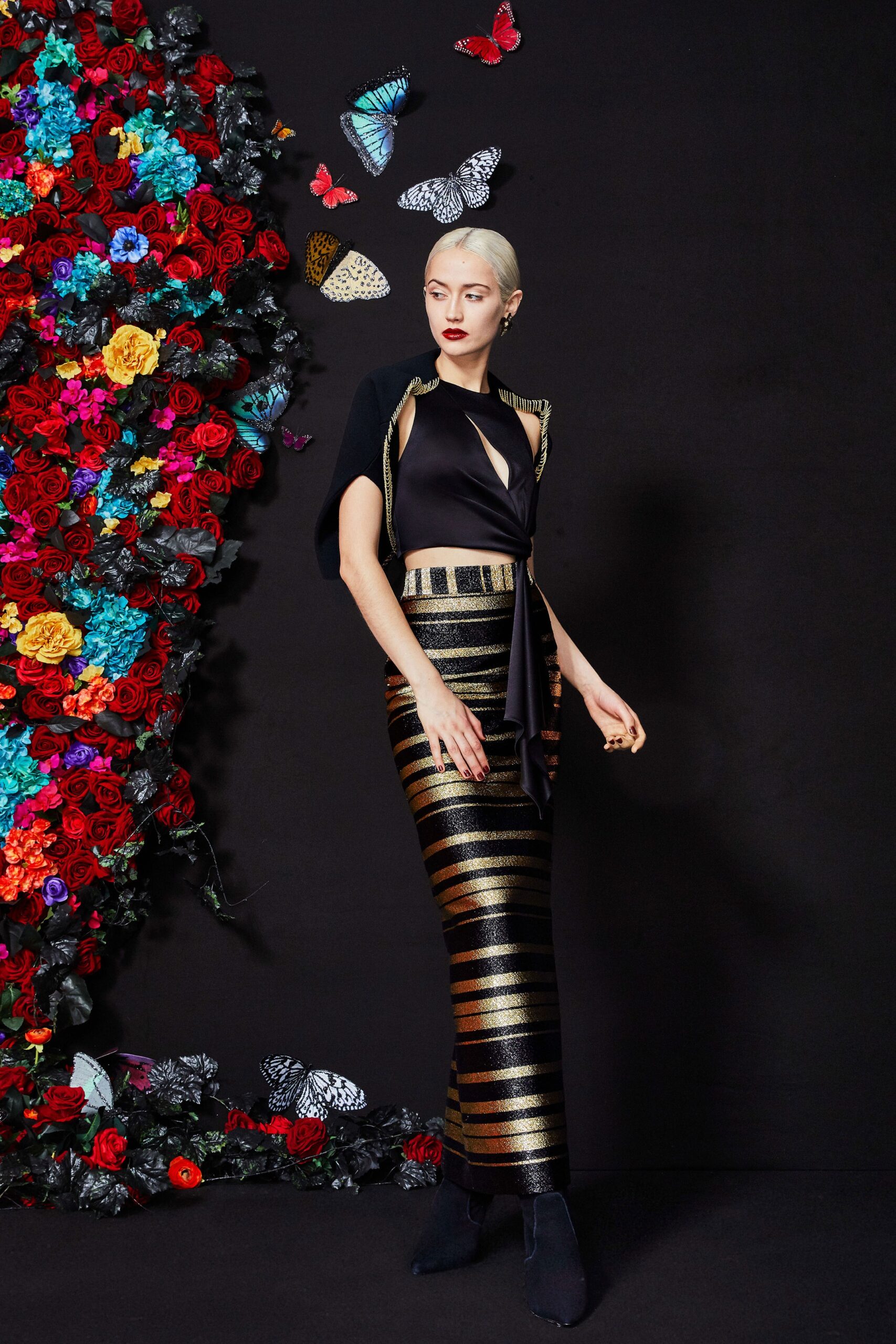 black silk draped top and gold pencil skirt