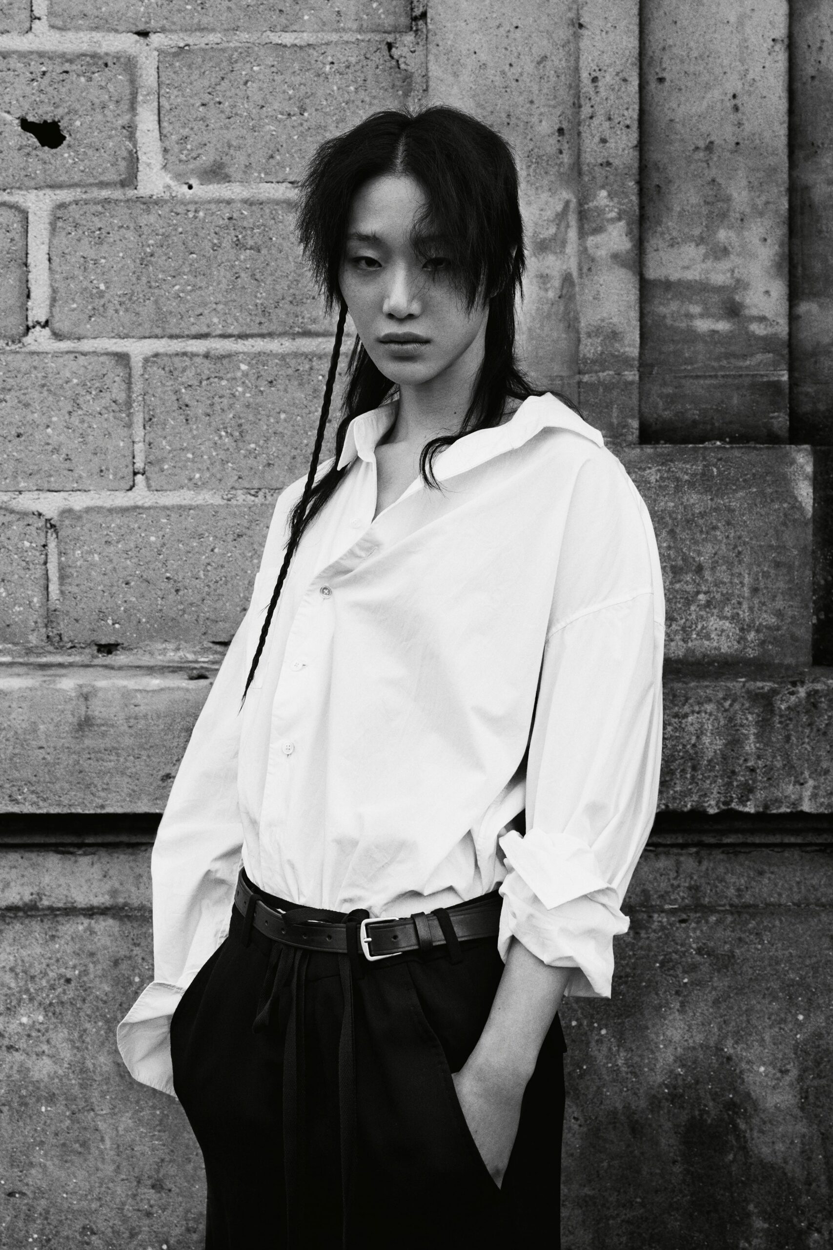 white relaxed shirt and black fitted pants