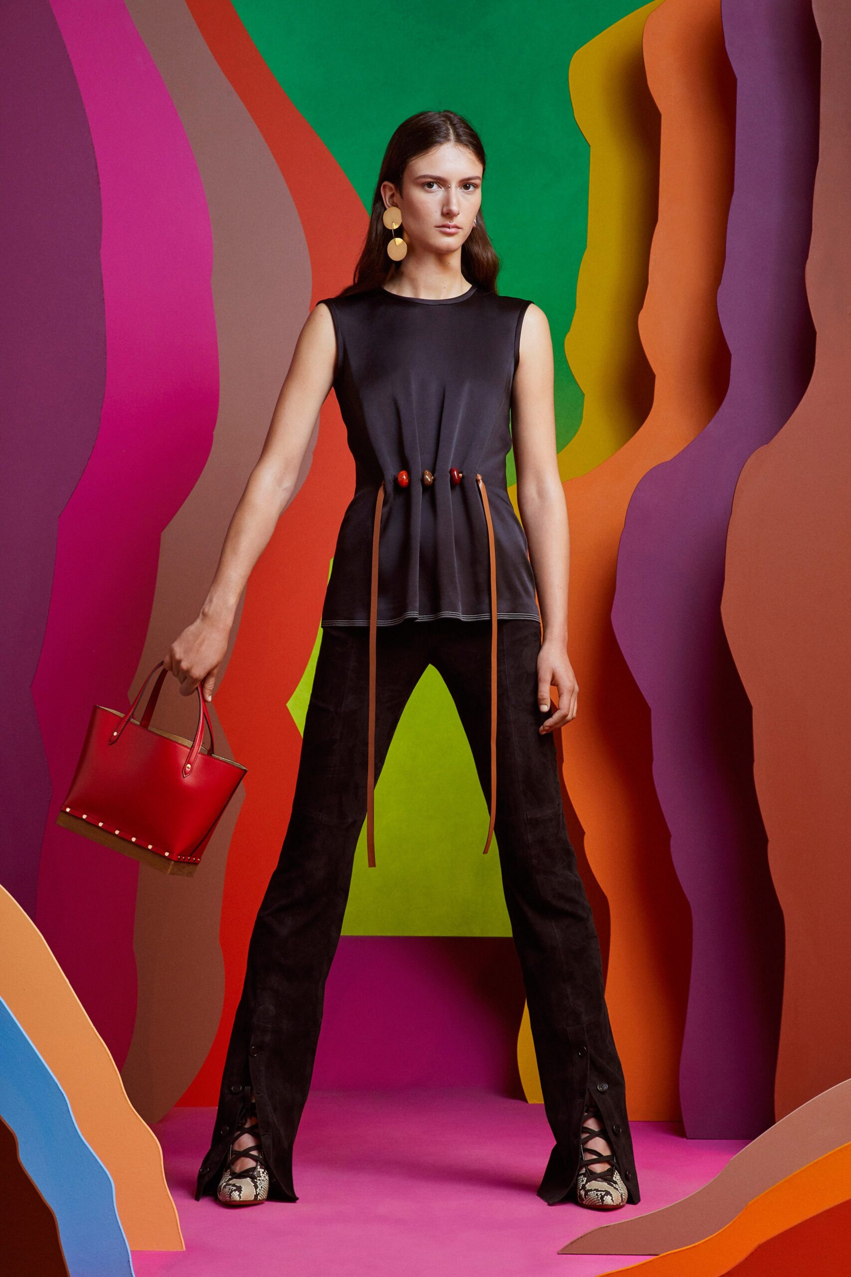 black fitted top with brown flared pants