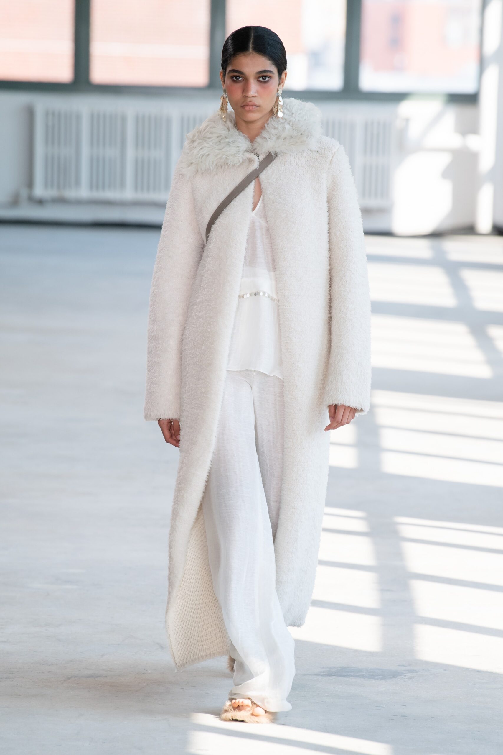 white faux-fur coat with blouse and pants