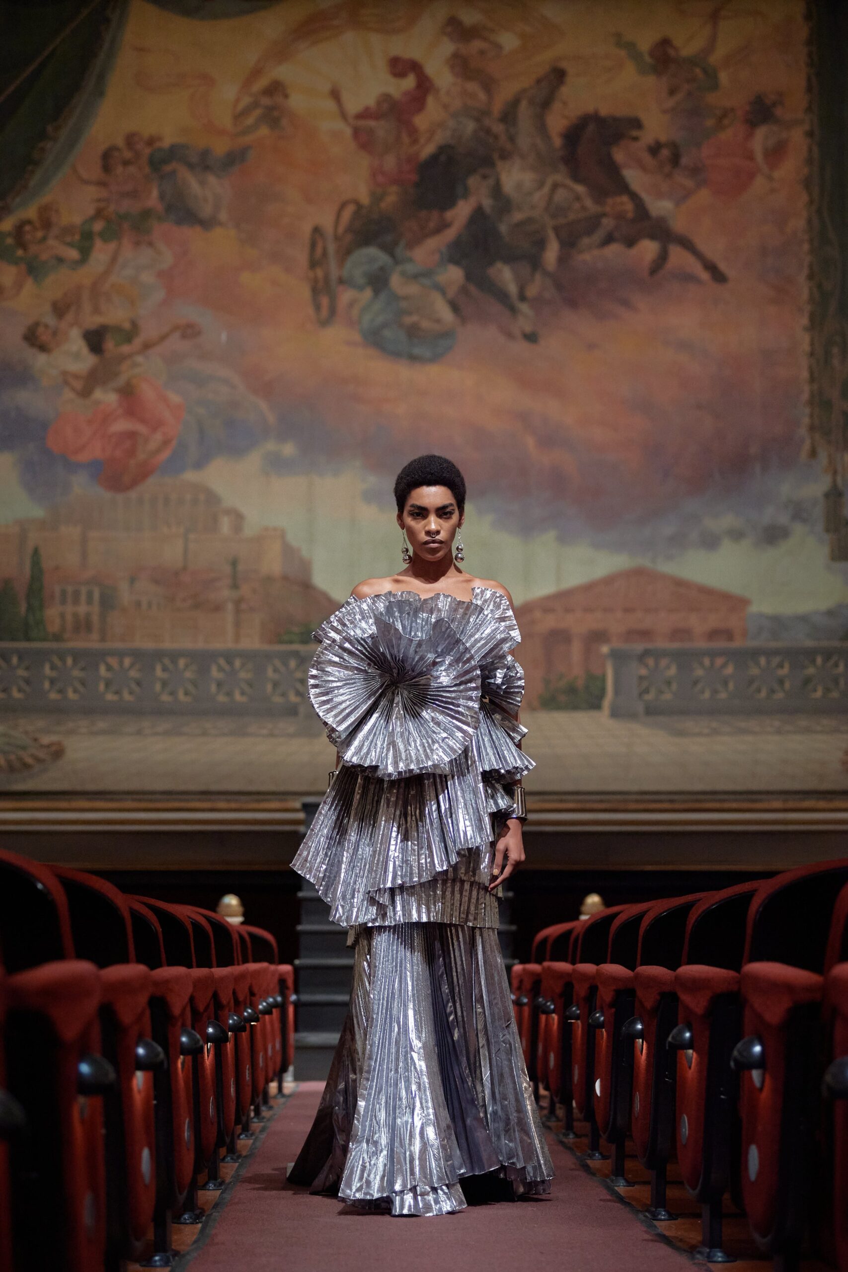 silver pleated off-shoulder gown