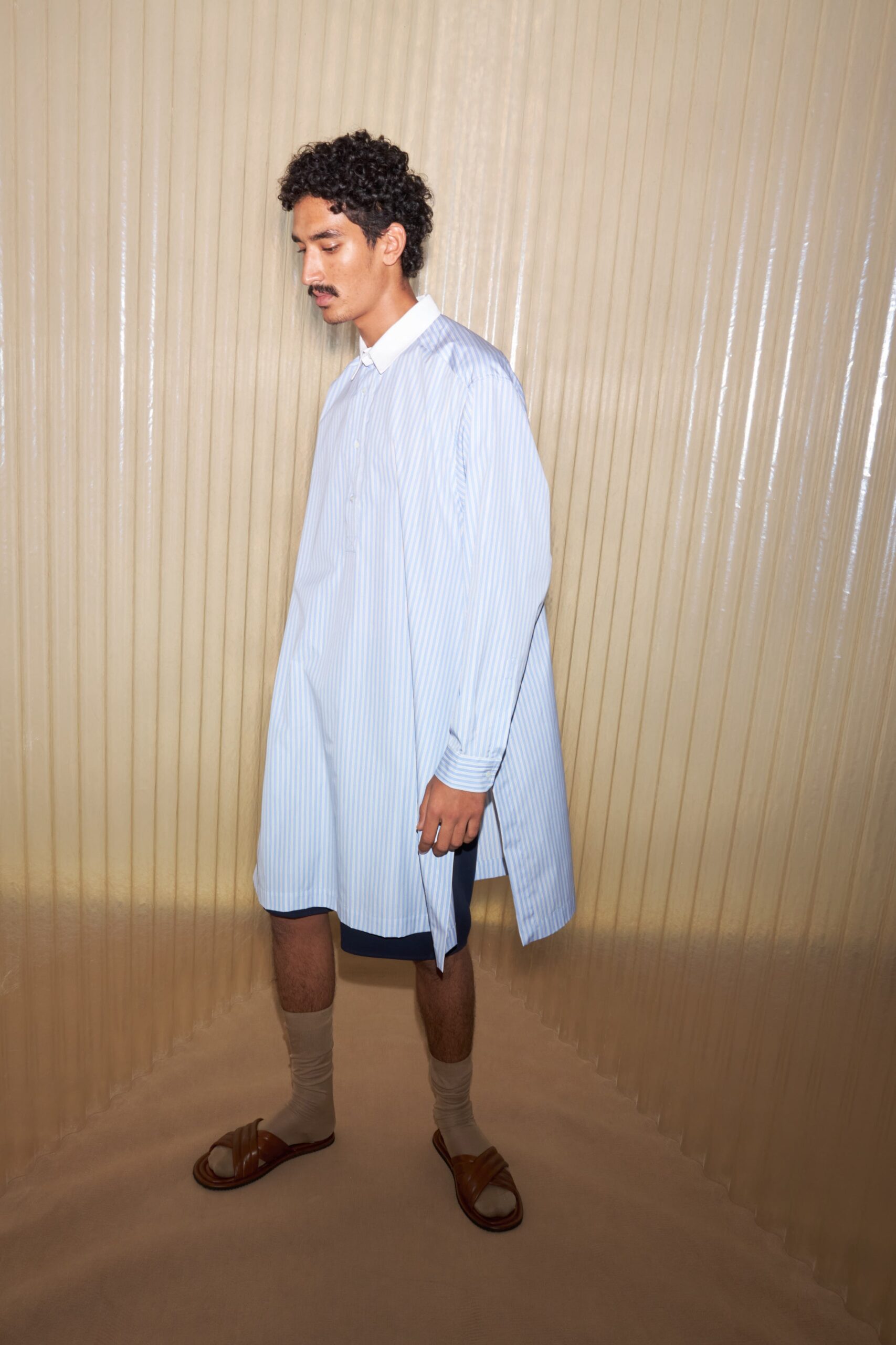 oversized blue striped shirt with black shorts