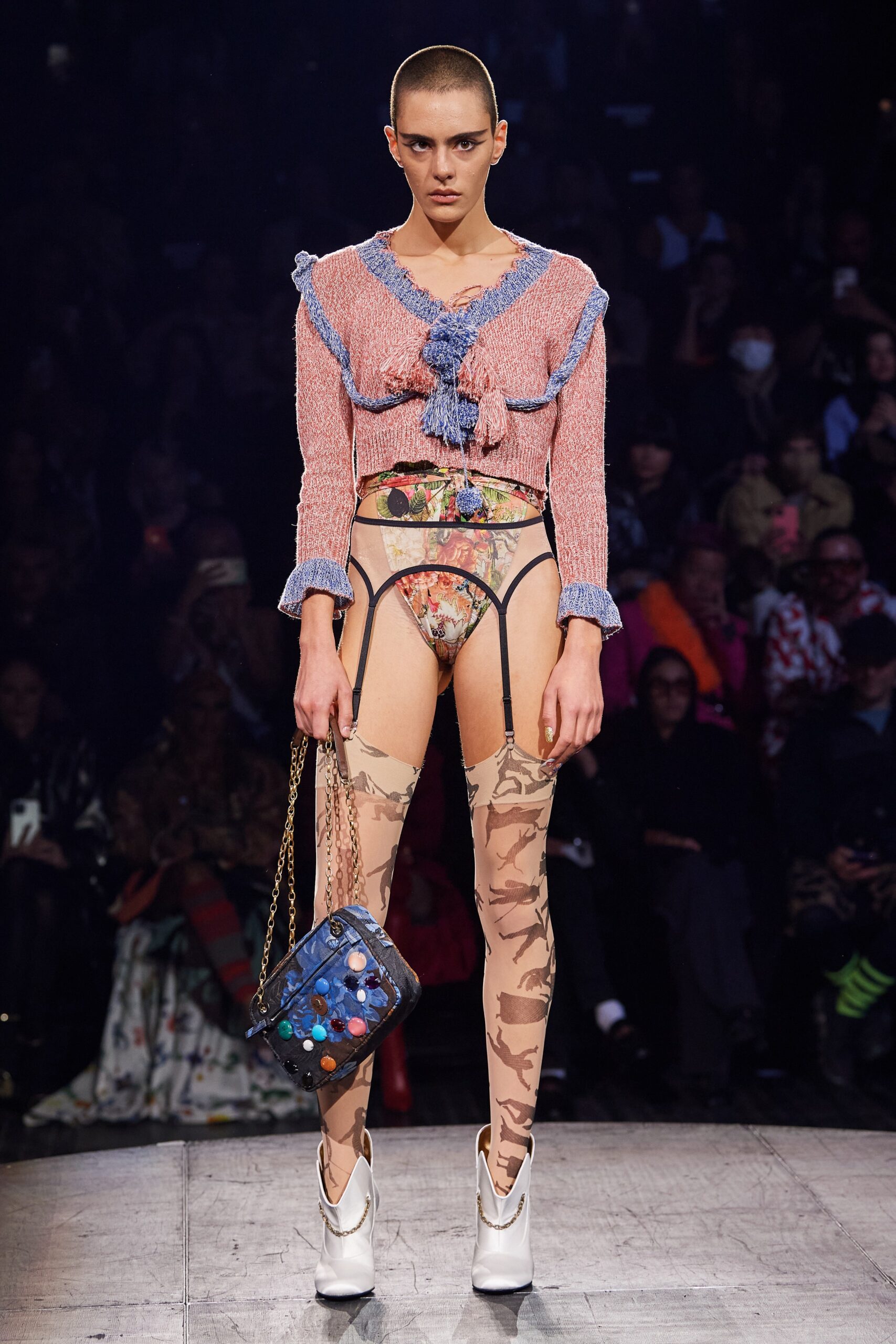 pink knit fitted top with cargo pants