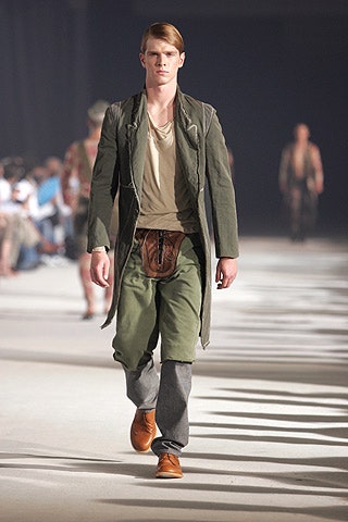 green coat beige shirt cargo pants