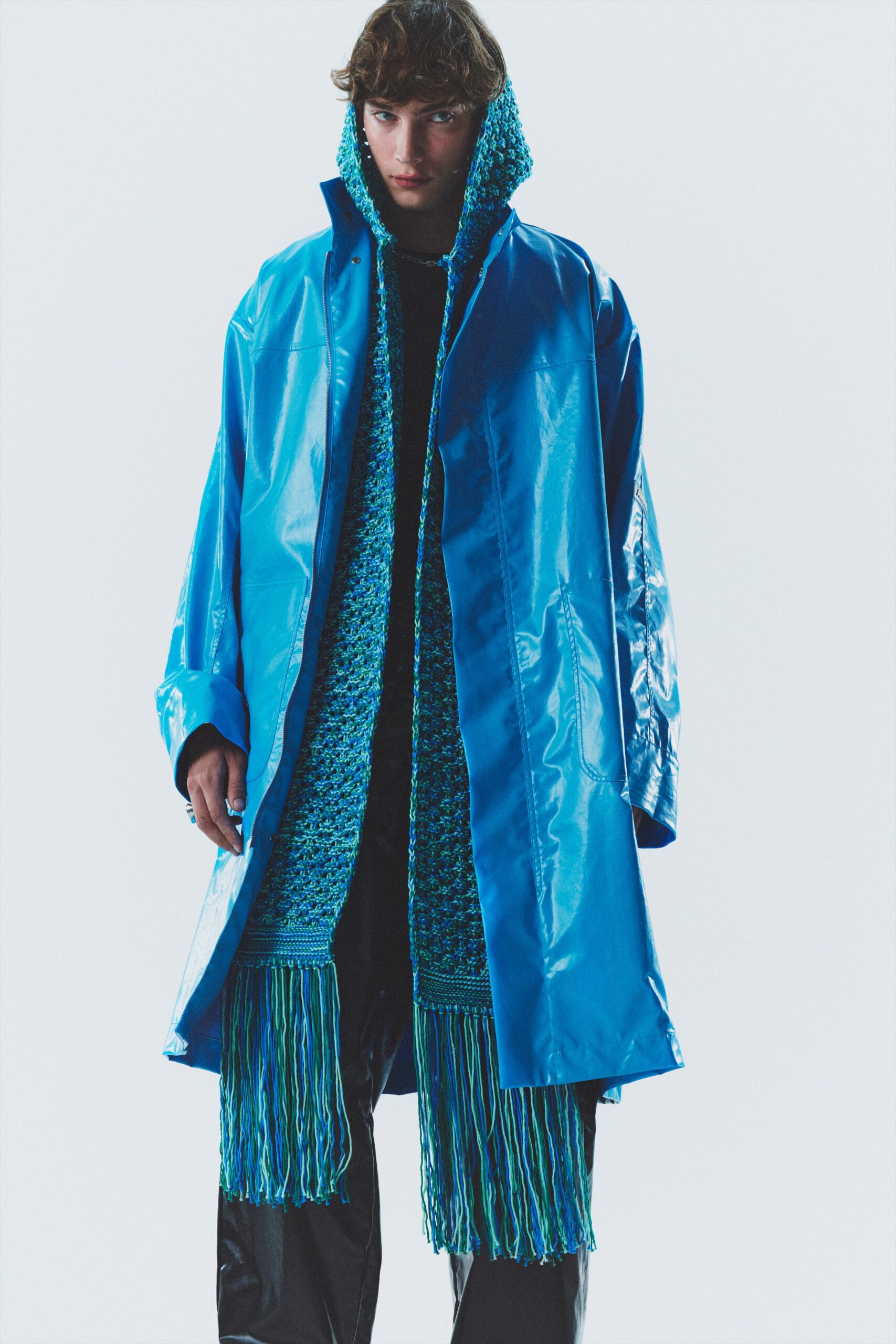 blue vinyl coat with multi scarf