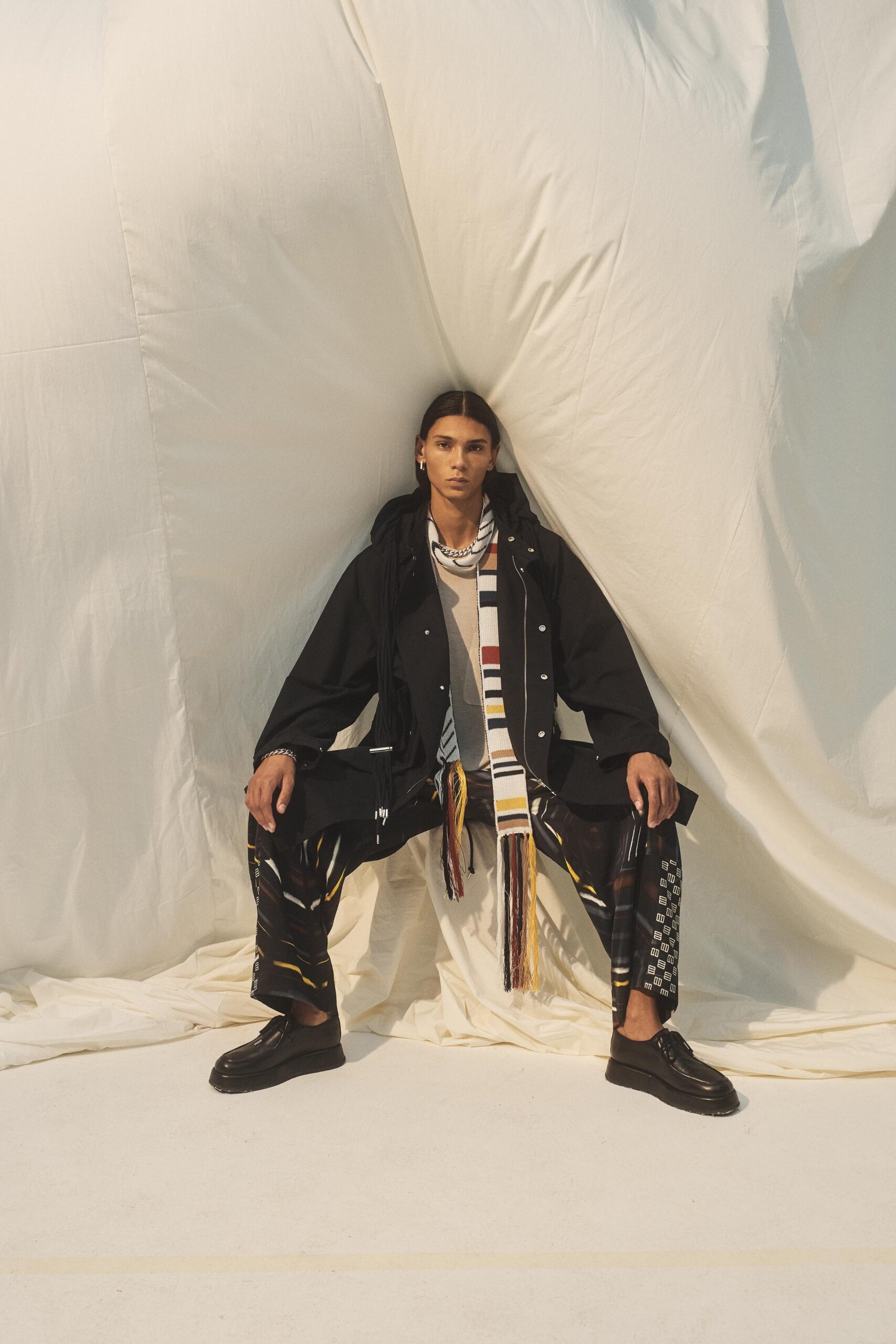 black relaxed jacket with printed pants